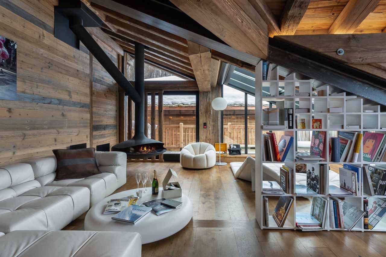 Contemporary fireplace in living area of Apartment Snowy Breeze in Val d'Isere