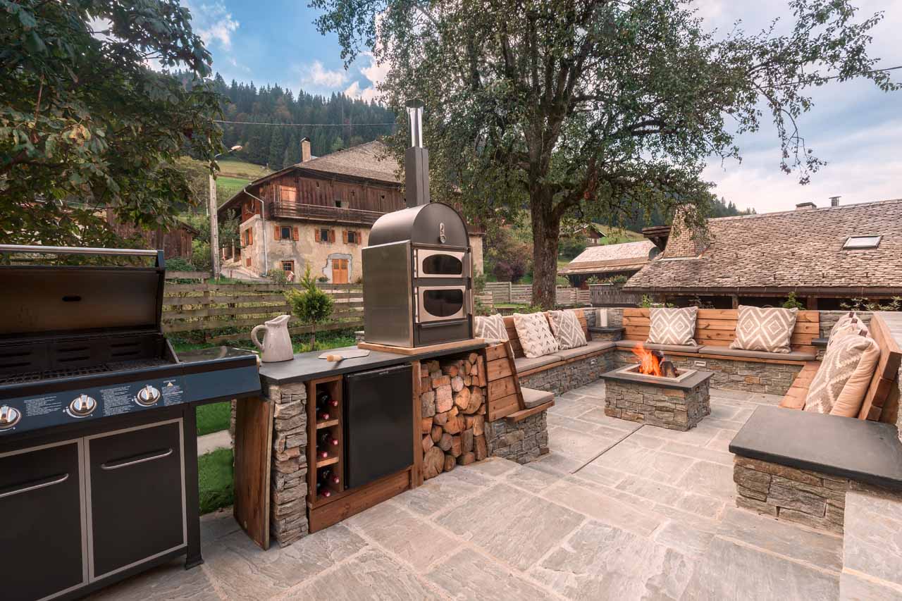 Firepit and terrace at Chalet 46 in Morzine in summer
