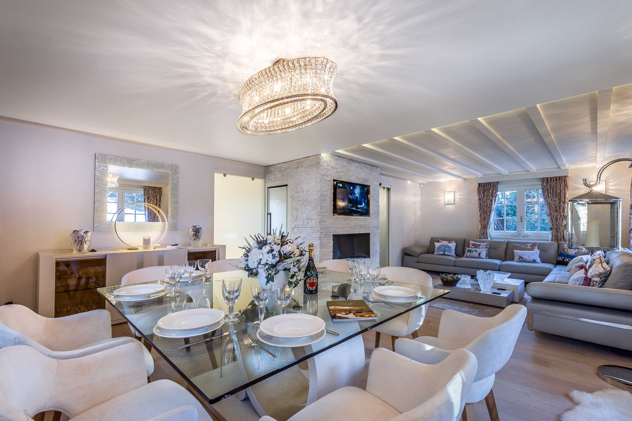 Dining area adjacent to living room in Chalet Amnesia in Courchevel 1650