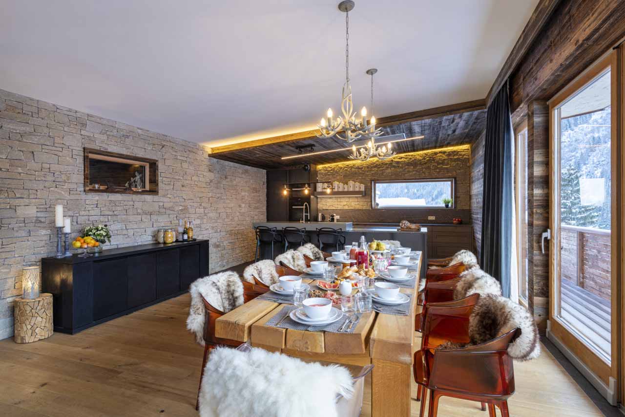 Wooden dining table at Chalet Bluebird in St Anton