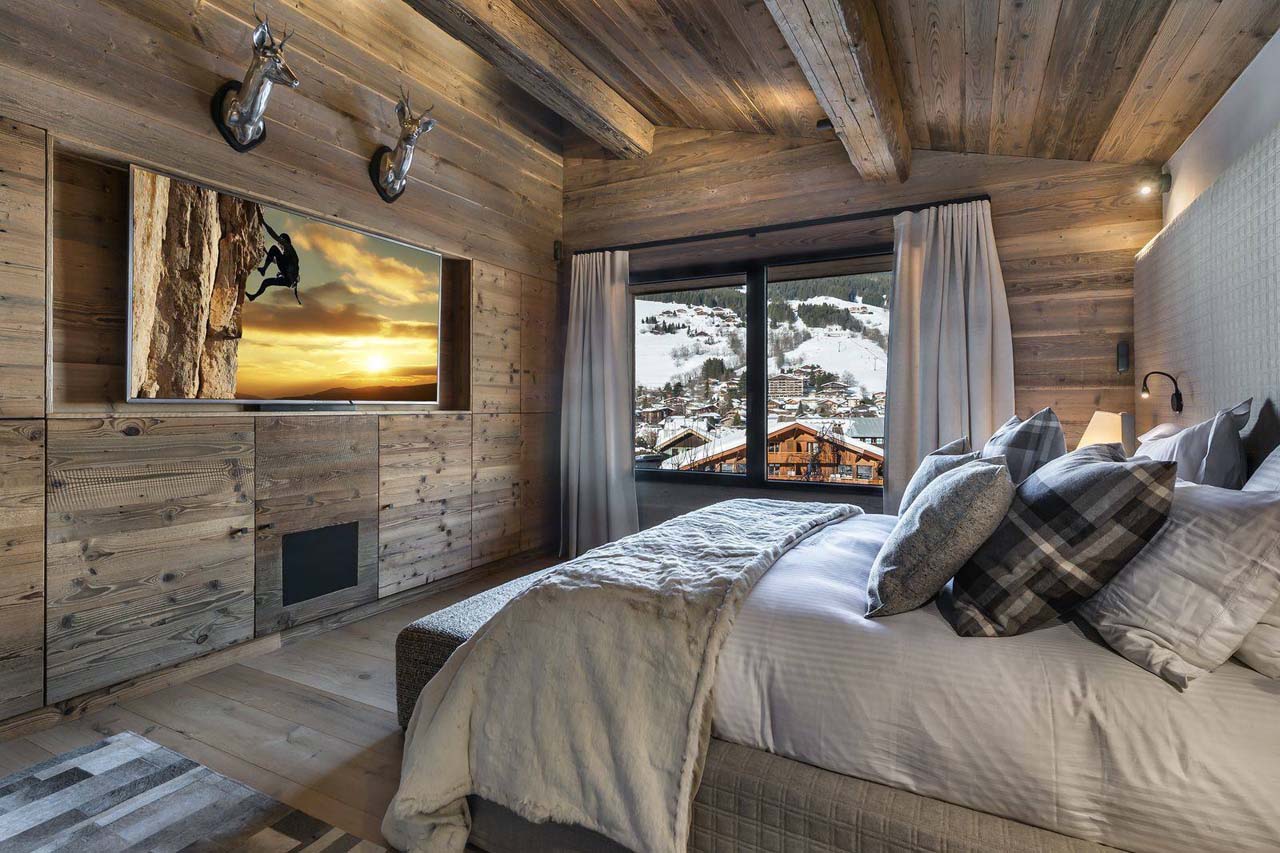 TV in bedroom four at Chalet Lamartine in Megeve