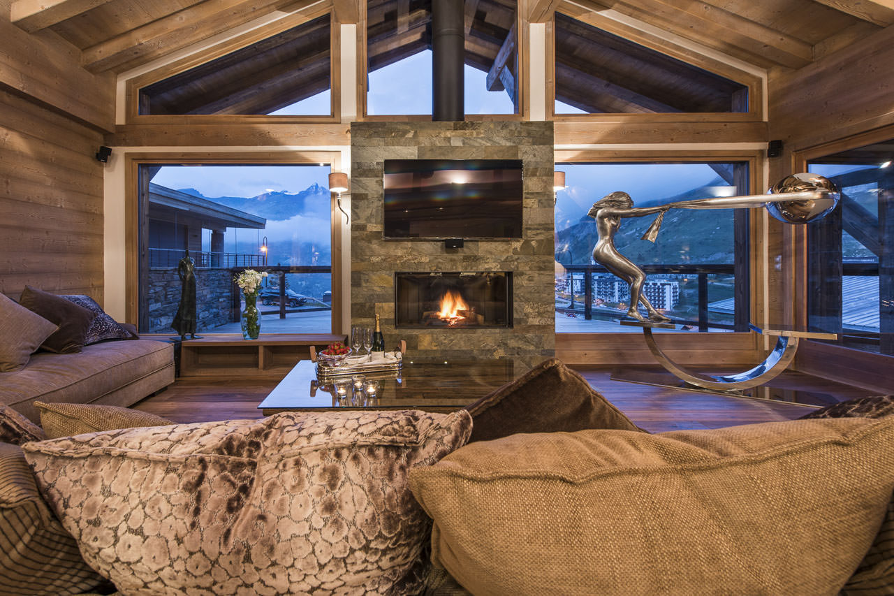 Fireplace in living area of Chalet Opale in Tignes