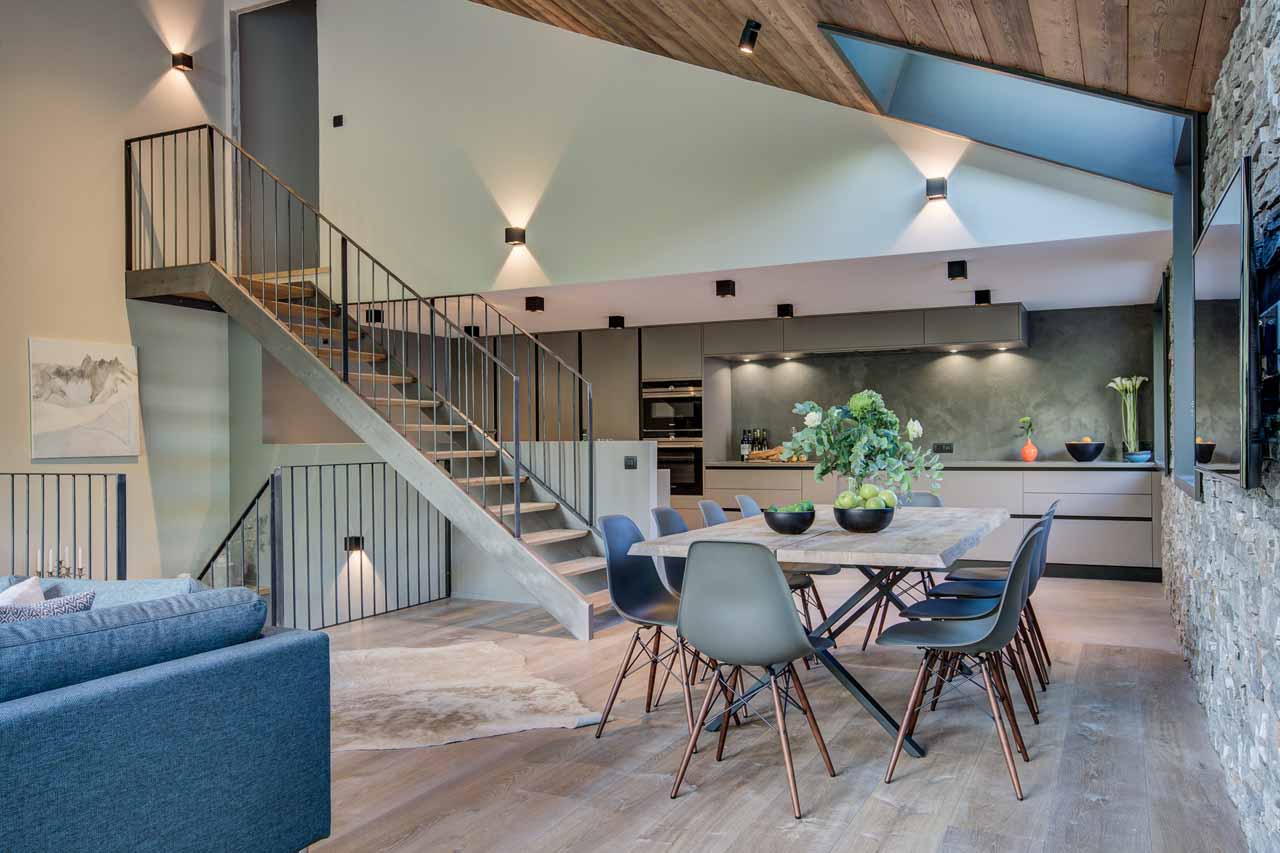 Dining room and kitchen at Open plan living area at Chalet Rytola
