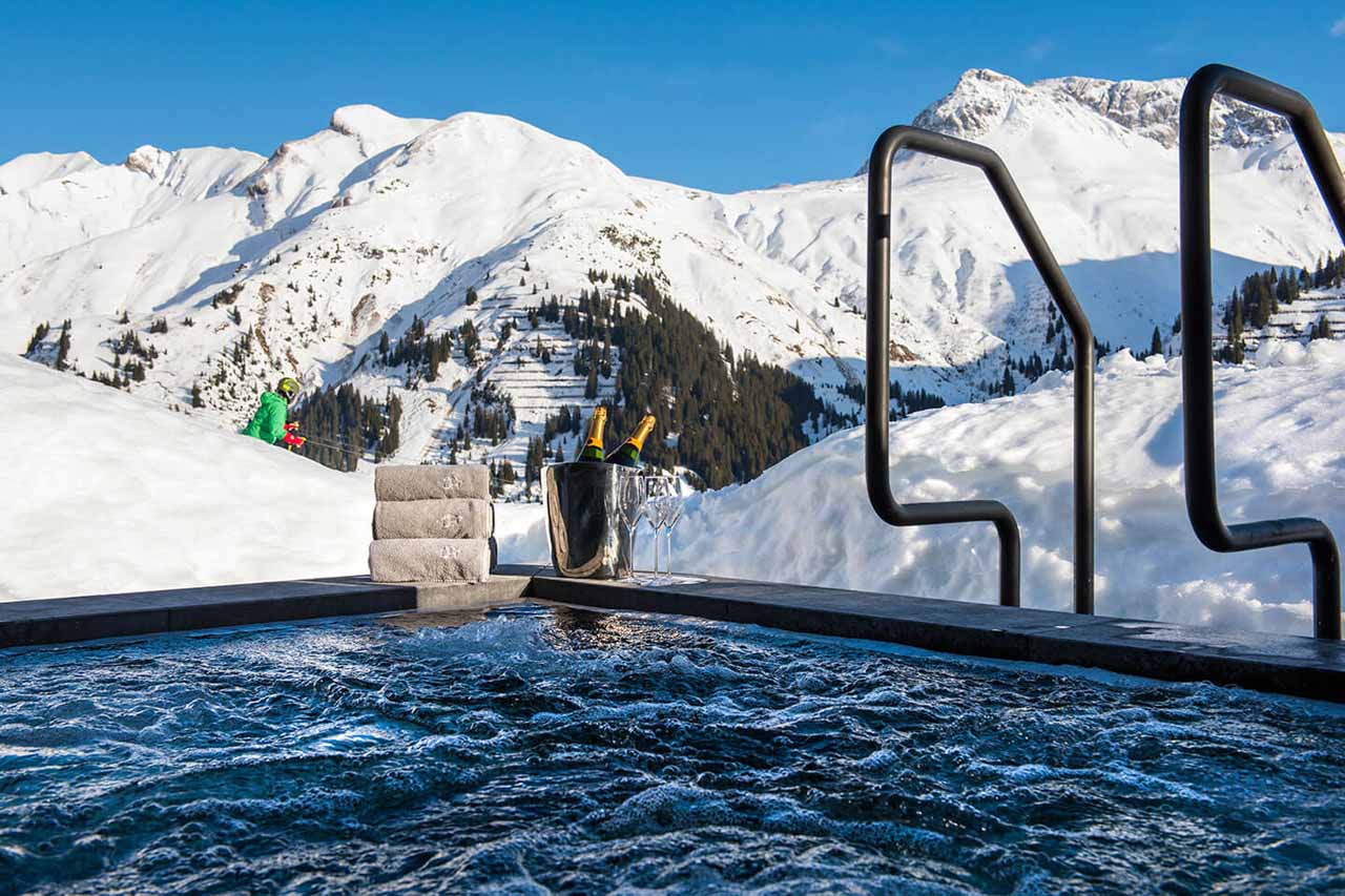 Outdoor hot tub at Chalet Uberhaus in Lech