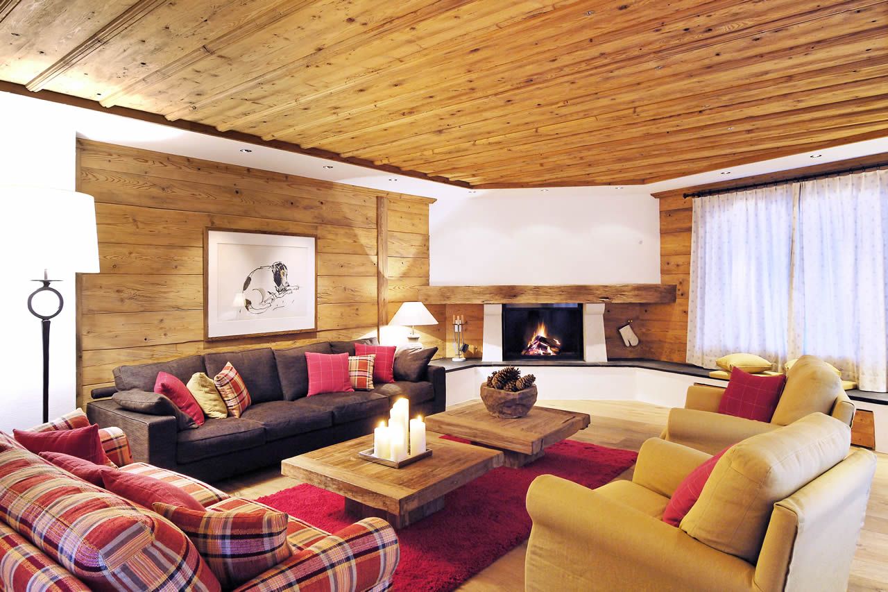 Fireplace in living room of Chesa Falcun in Klosters