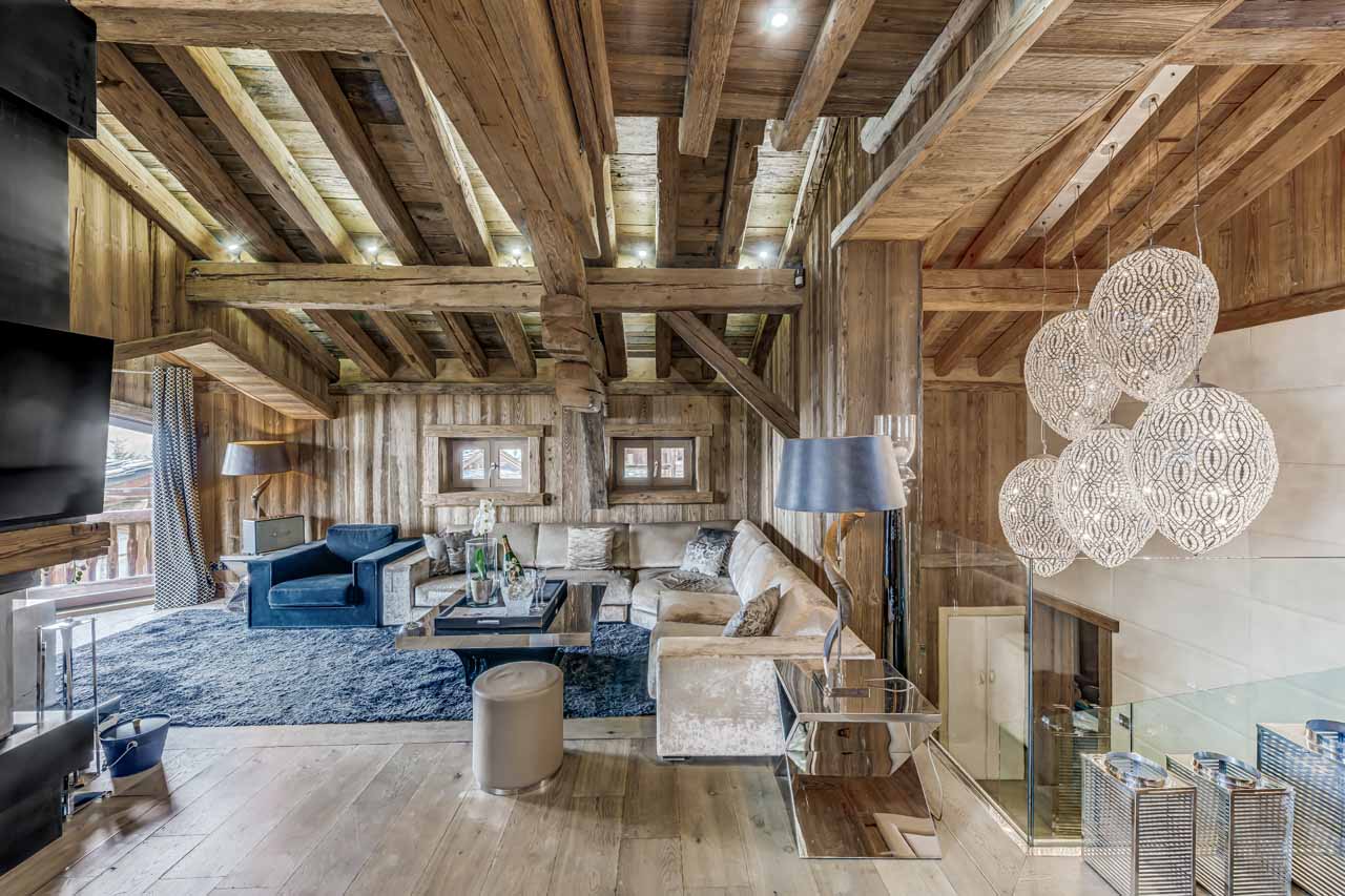 Spacious living area with plush sofas in Chalet Carat in Courchevel 1850
