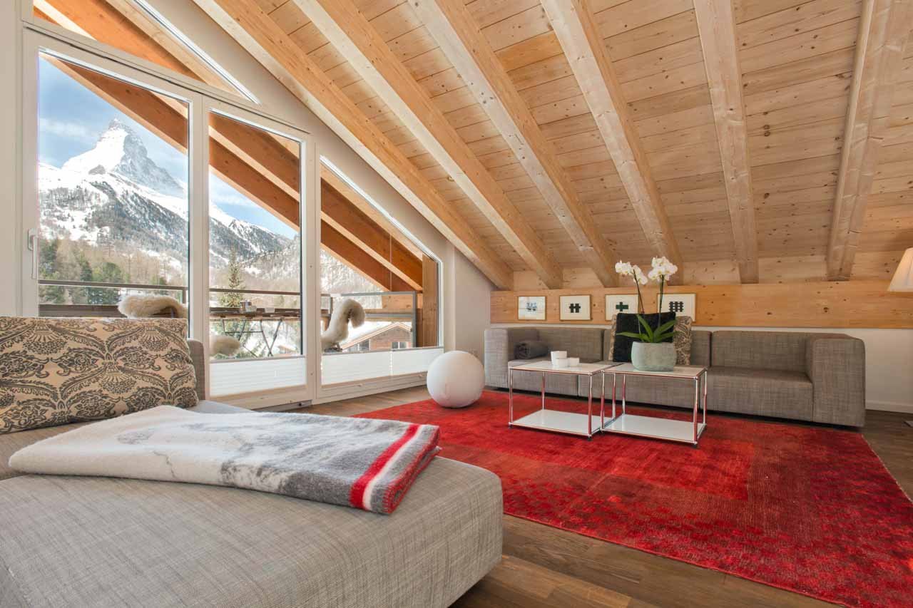 Open plan living area at Penthouse Altesse in Zermatt