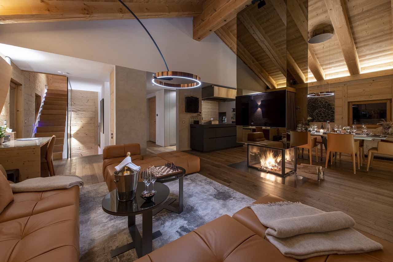 Living area at night at Chalet Belle Claire in Verbier