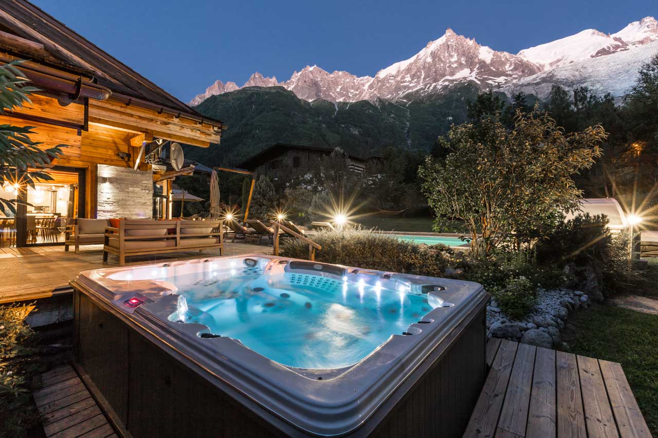 Outdoor hot tub with mountain views at Chalet Couttet in Chamonix