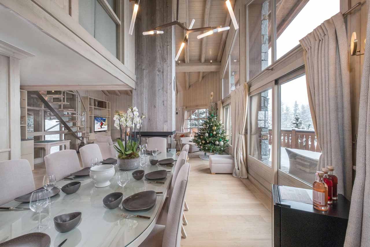 Dining area with balcony access, Chalet Edelstone in Courchevel 1850