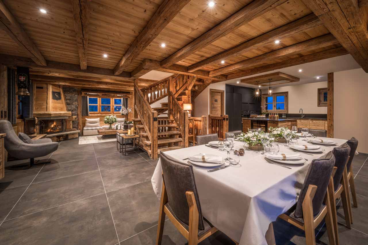 Dining area and kitchen at Chalet Le 1946 in Courchevel Le Praz