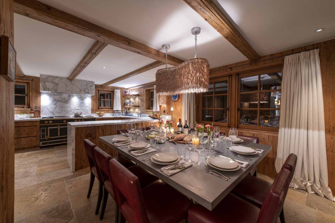 Dining area and kitchen at Chalet Virmadisa in Verbier