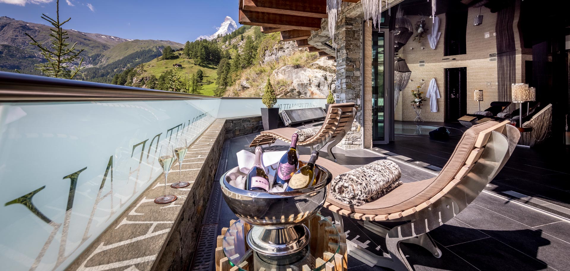 Chalet Zermatt Peak terrace in summer with Matterhorn