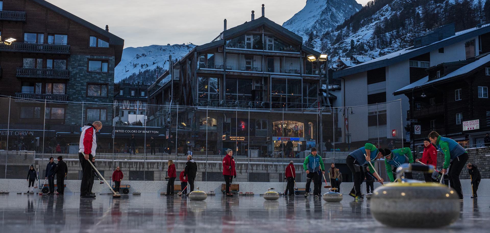 Curling on the ice rink in Zermatt
