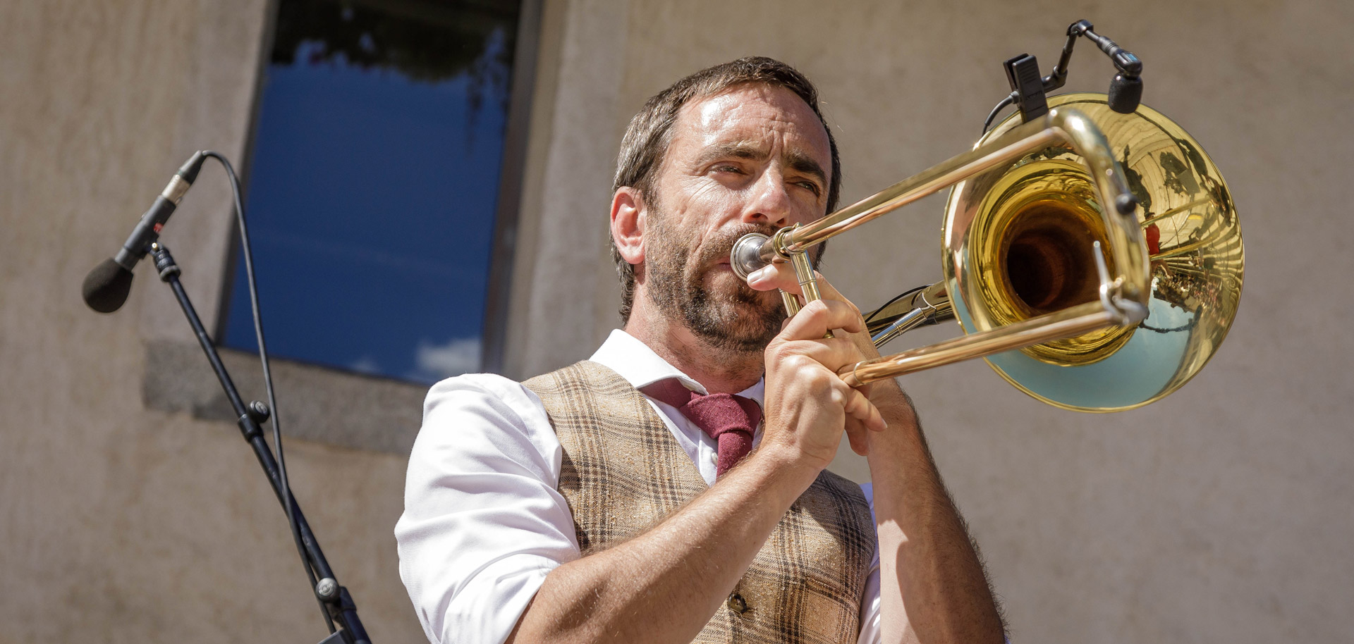 Man playing saxophone at Jazz Contest in Megeve in summer