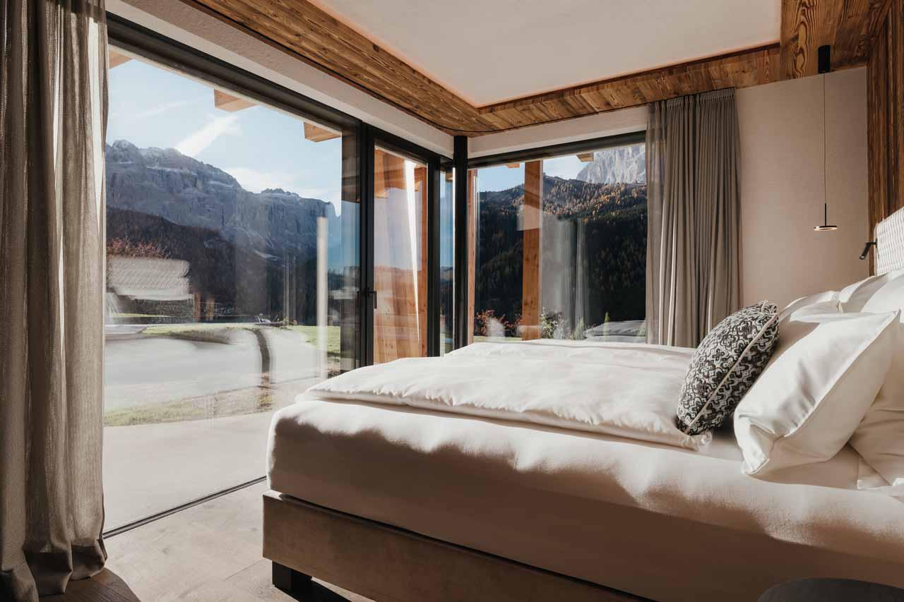 Bedroom one at Chalet Lum d'Or in Val Gardena