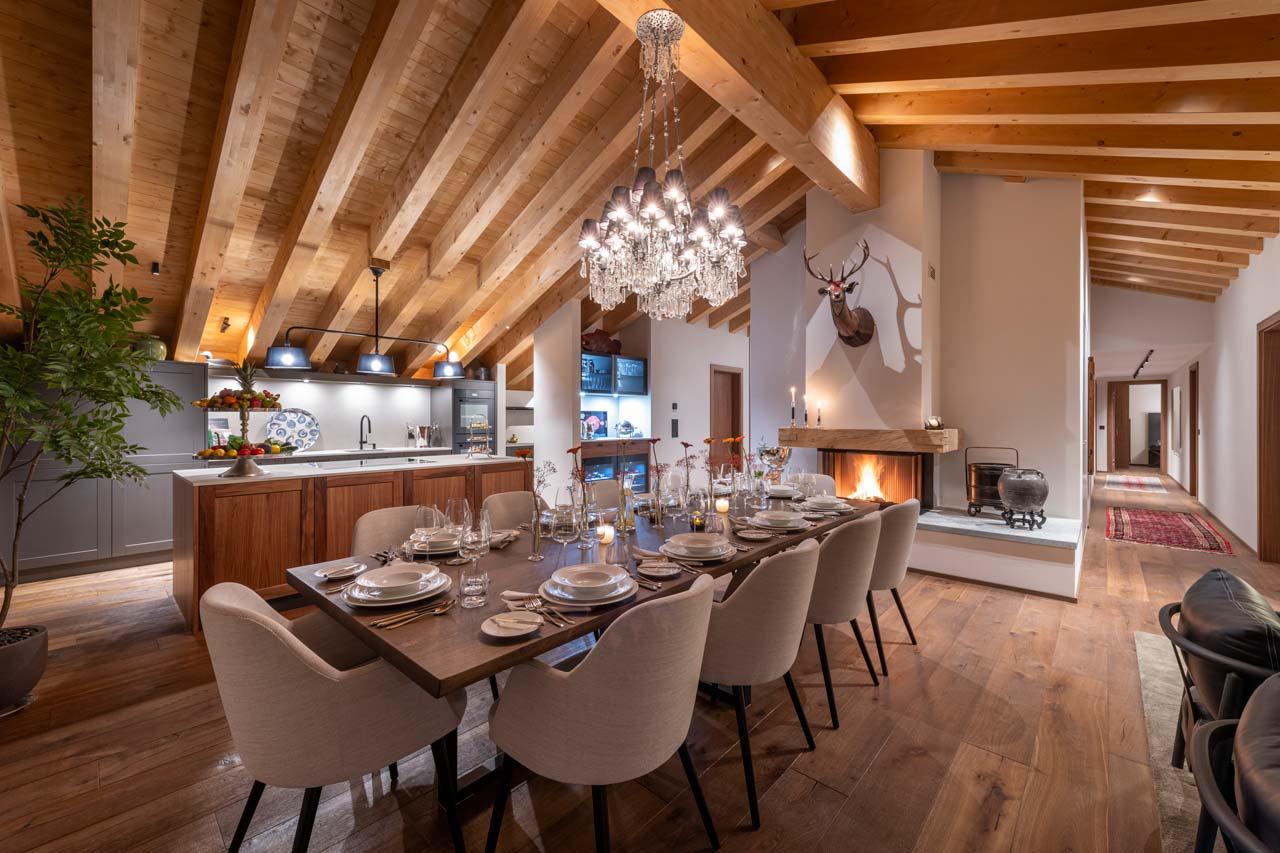Dining area and fireplace in Matterhorn Penthouse, Zermatt