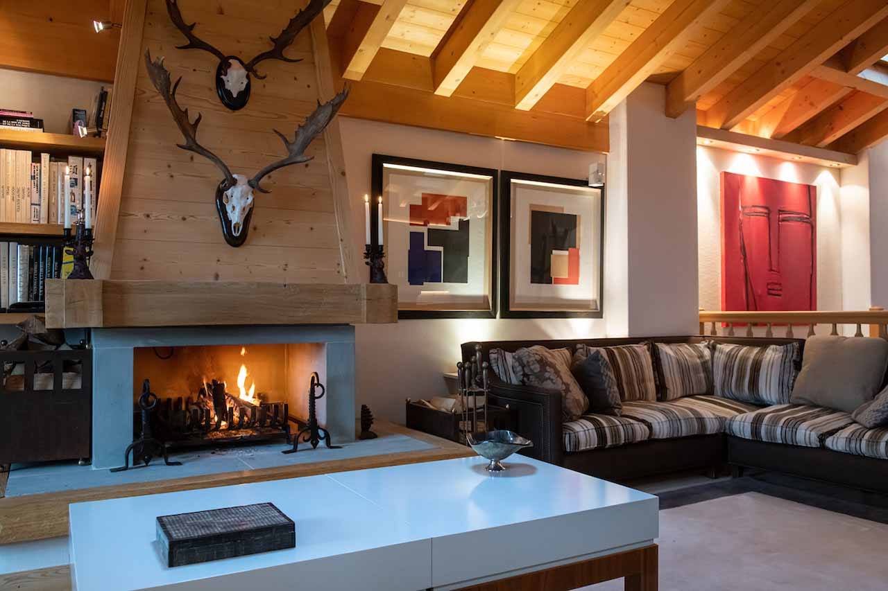 Fireplace in living area of Royal Penthouse in Villars sur Ollon