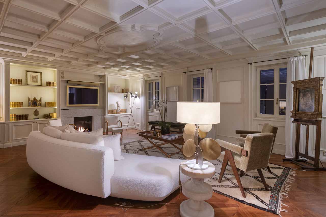Living area with sofa at night in Villa Erica 1, St Moritz