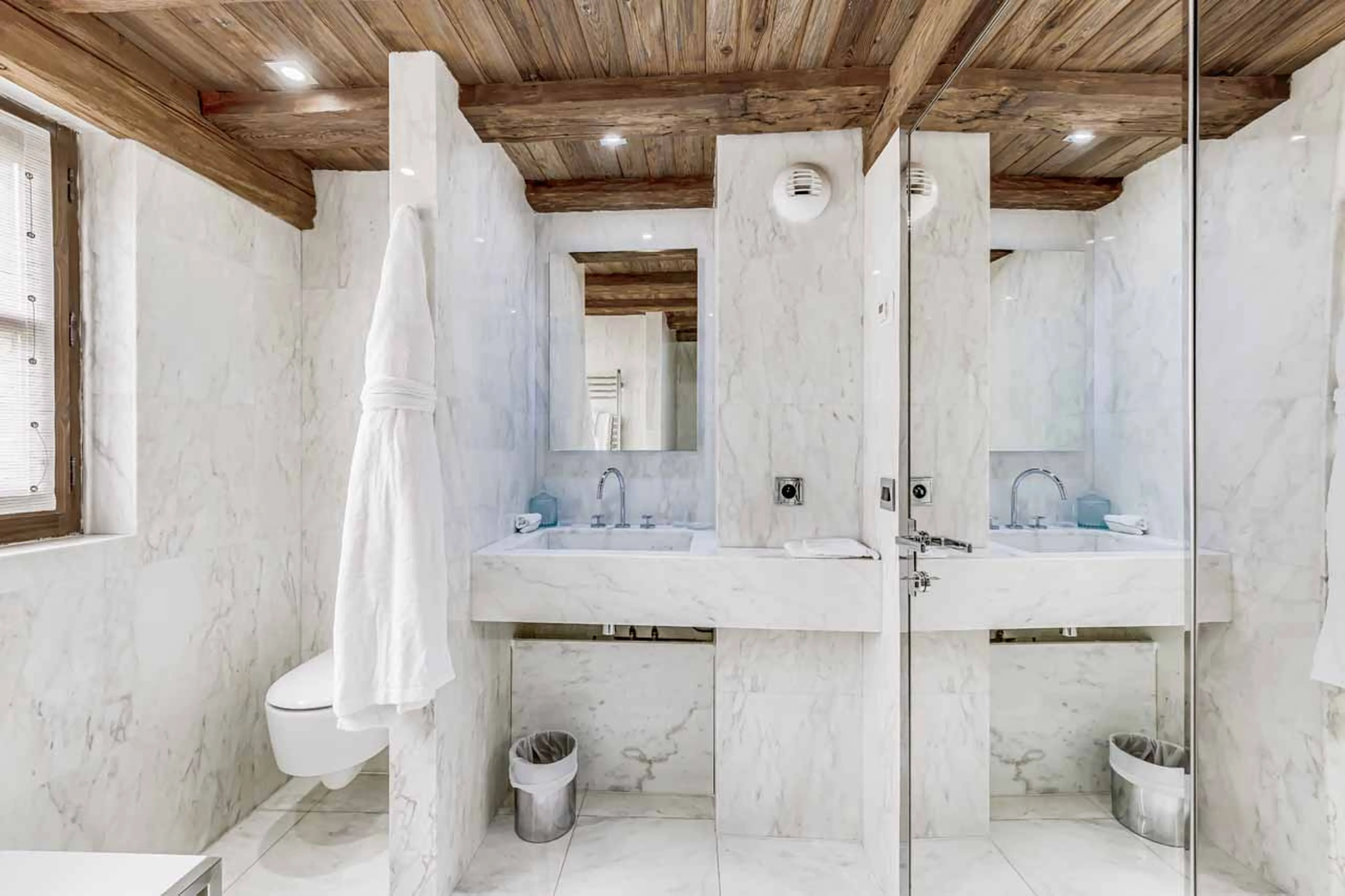 En suite shower room with marble trimmings in Chalet Carat in Courchevel 1850