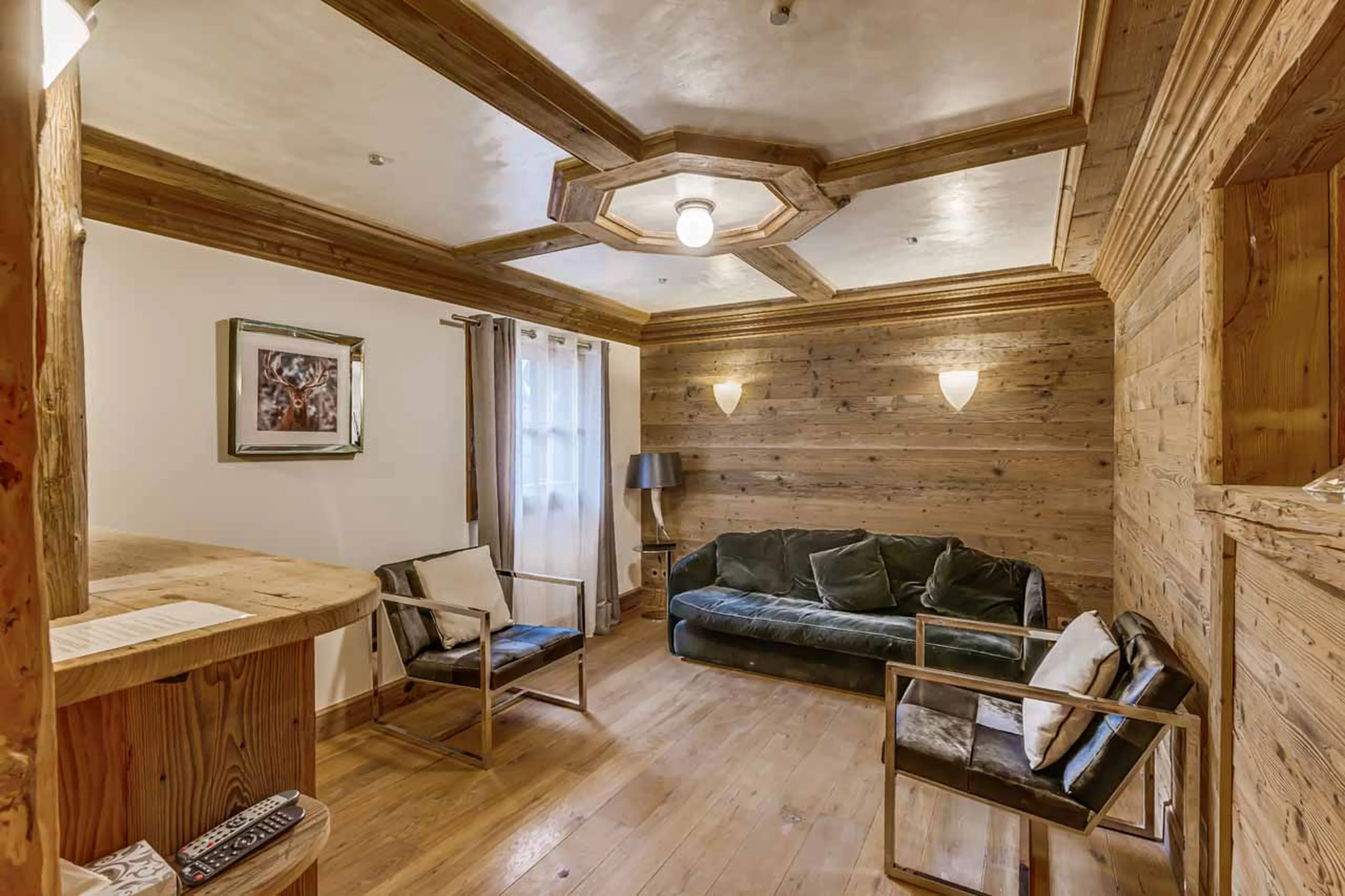Living room with kitchenette in private studio in Chalet Carat, Courchevel 1850