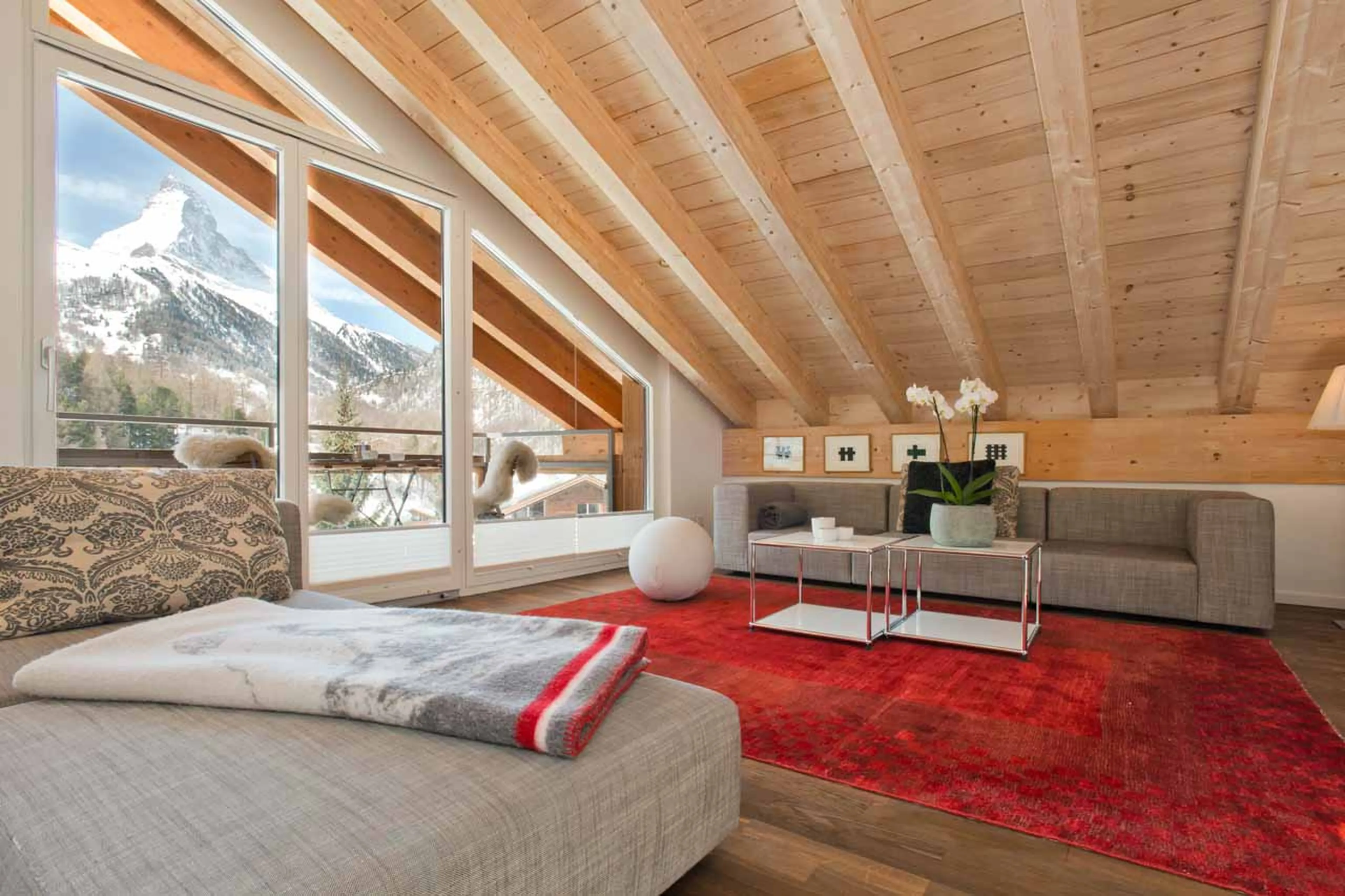 Open plan living area at Penthouse Altesse in Zermatt