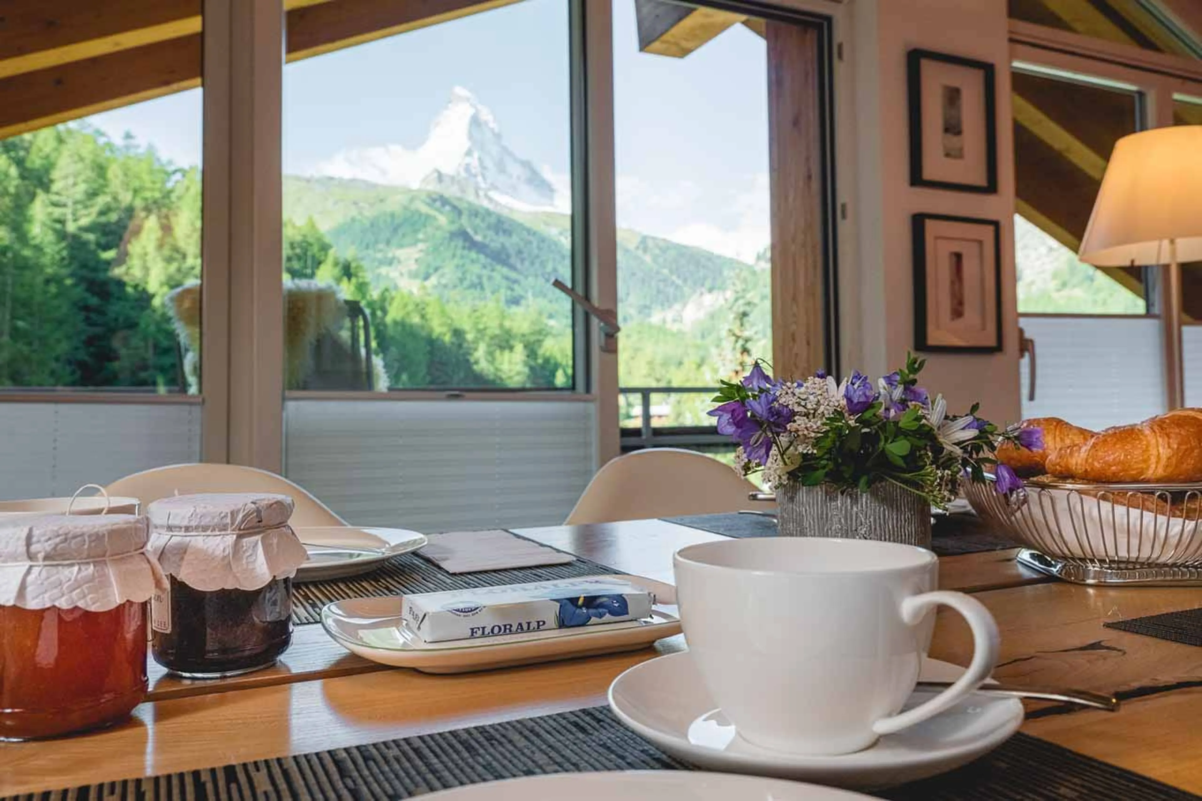 Matterhorn view from dining table in summer at Penthouse Altesse in Zermatt