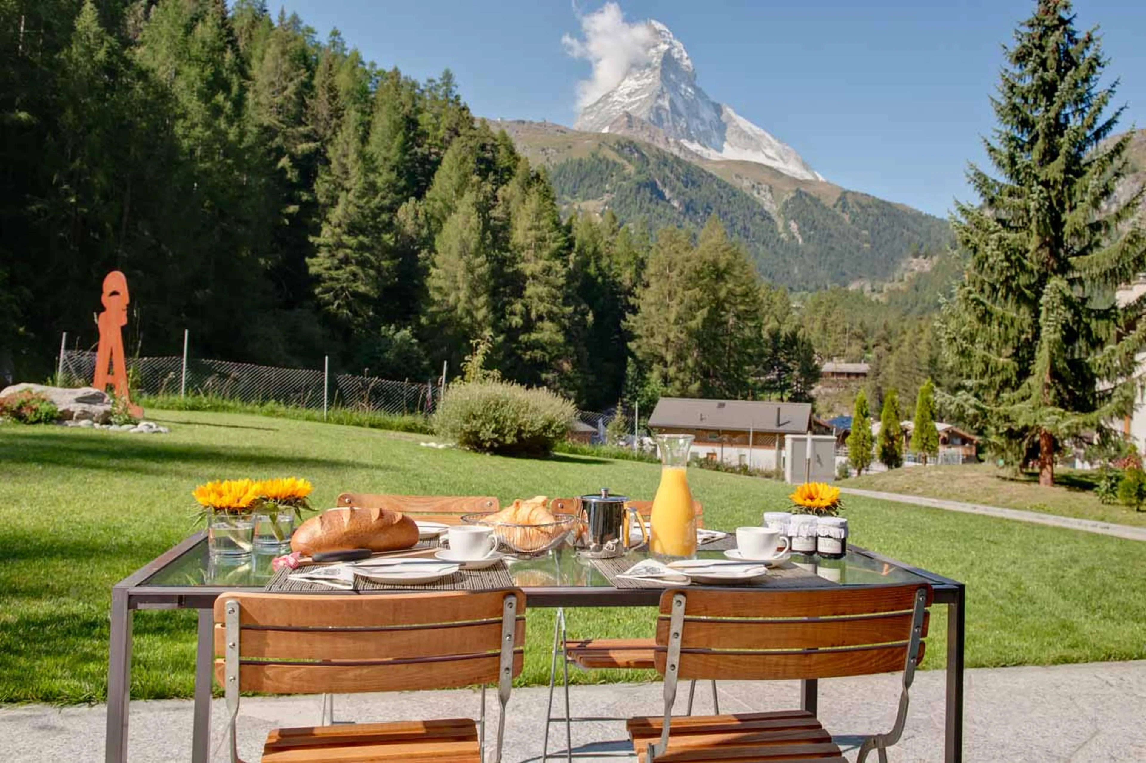 Matterhorn view from the terrace of Beautiful location of Chalet Altesse in Zermatt in summer