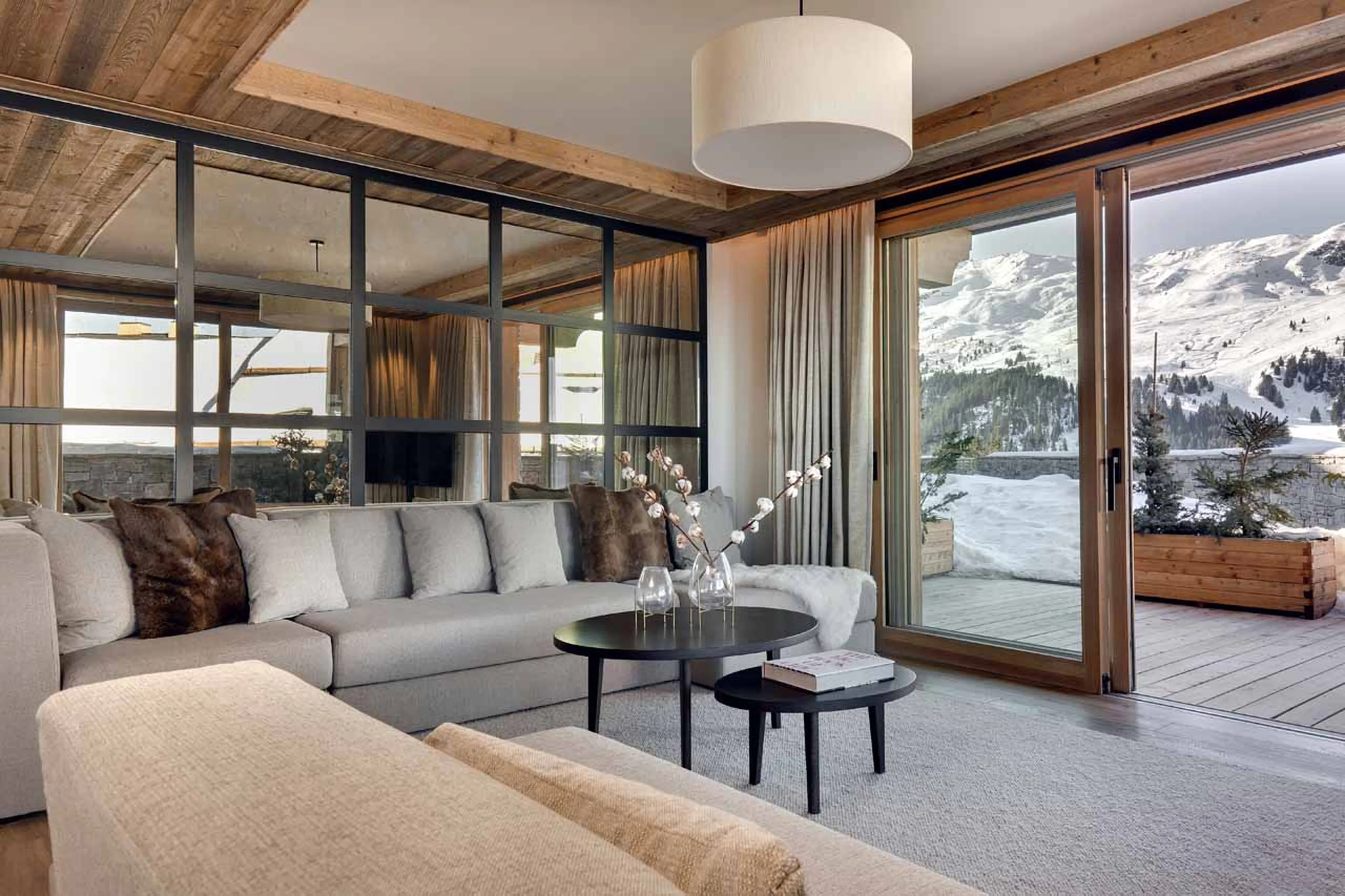 Living area opening onto terrace at Apartment Antares Mira 002 in Meribel