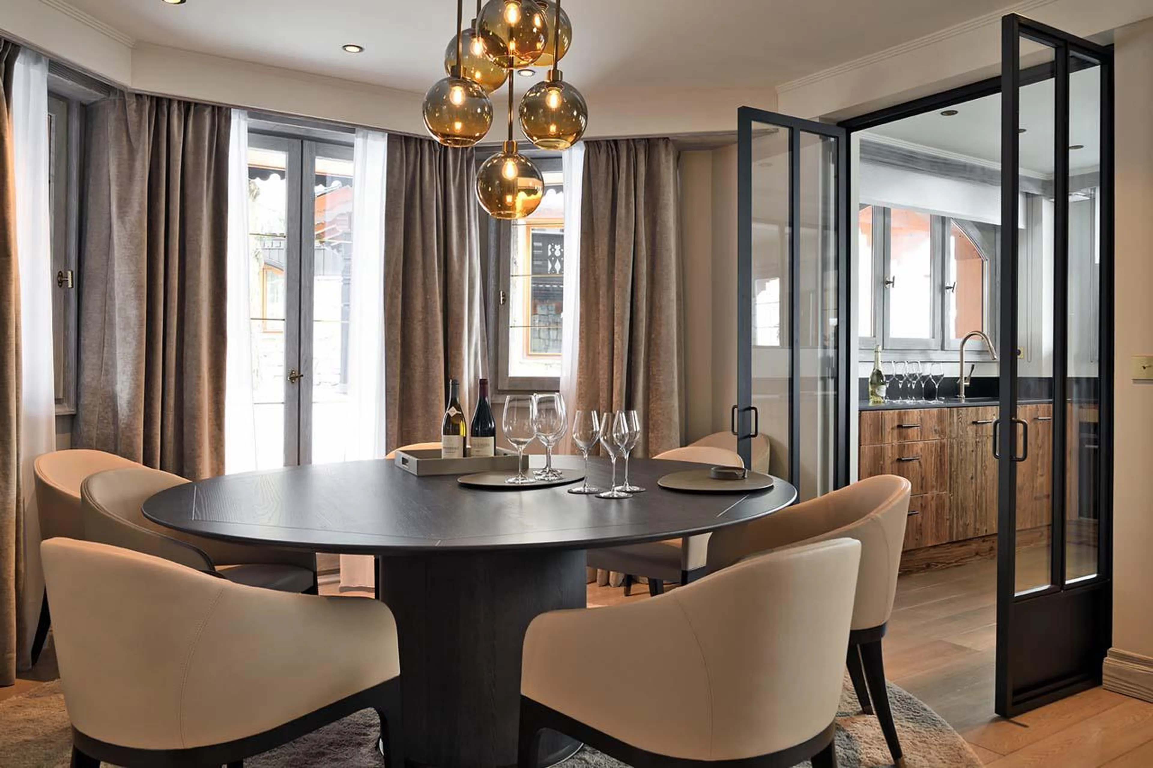 Spacious dining table with seating for six at Apartment Ariondaz in Courchevel 1850