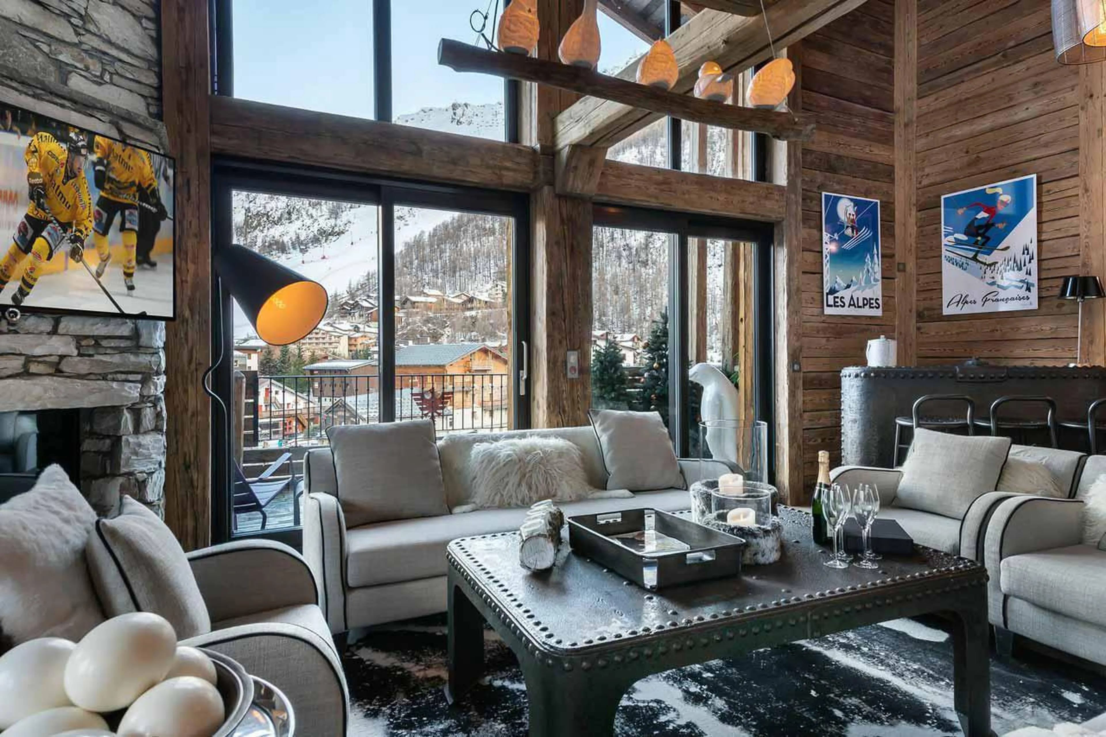 Double height windows in living room at Chalet Artemis in Val d'Isere