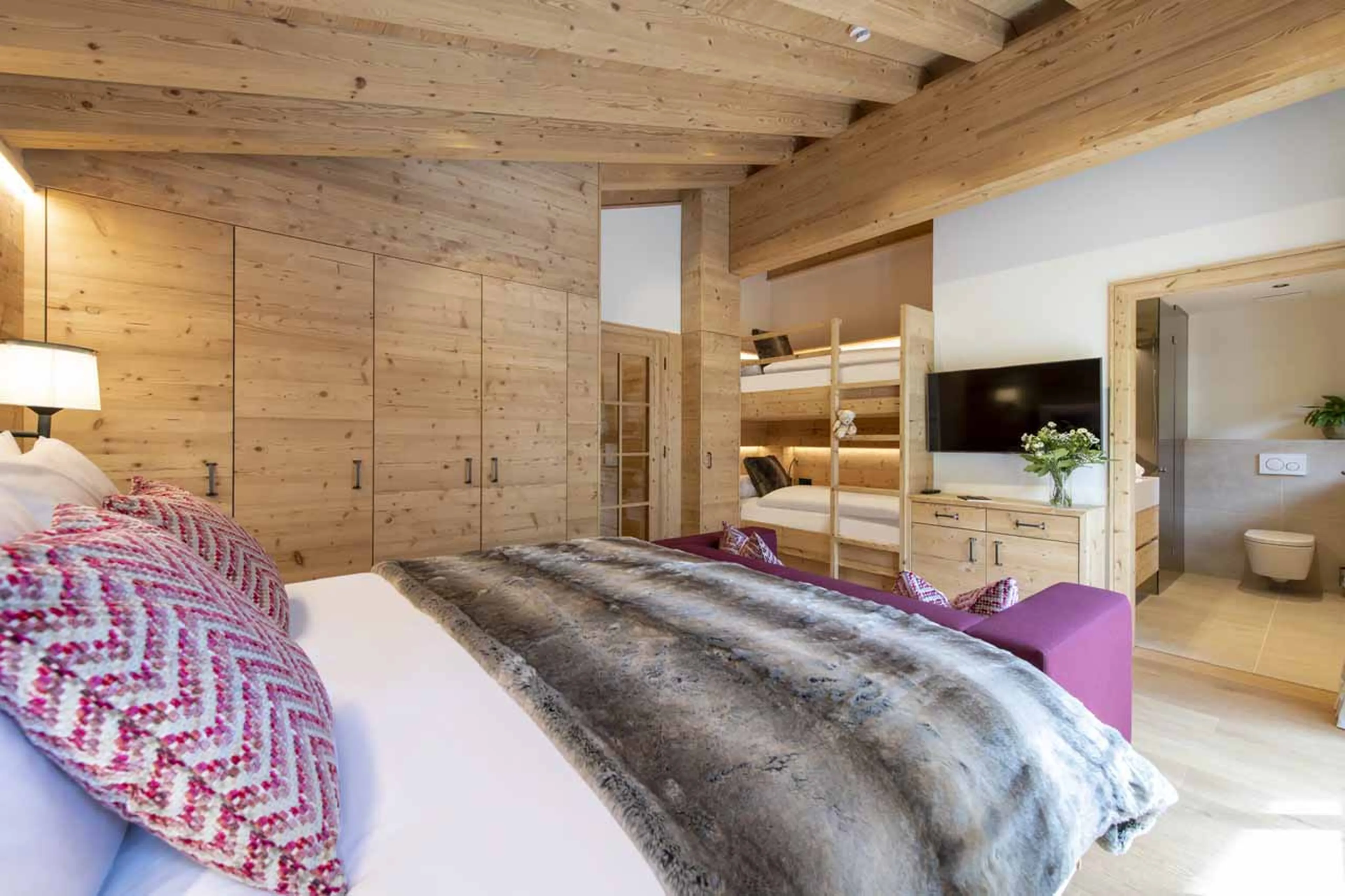 Double bed at Brunnenhof Penthouse in Lech