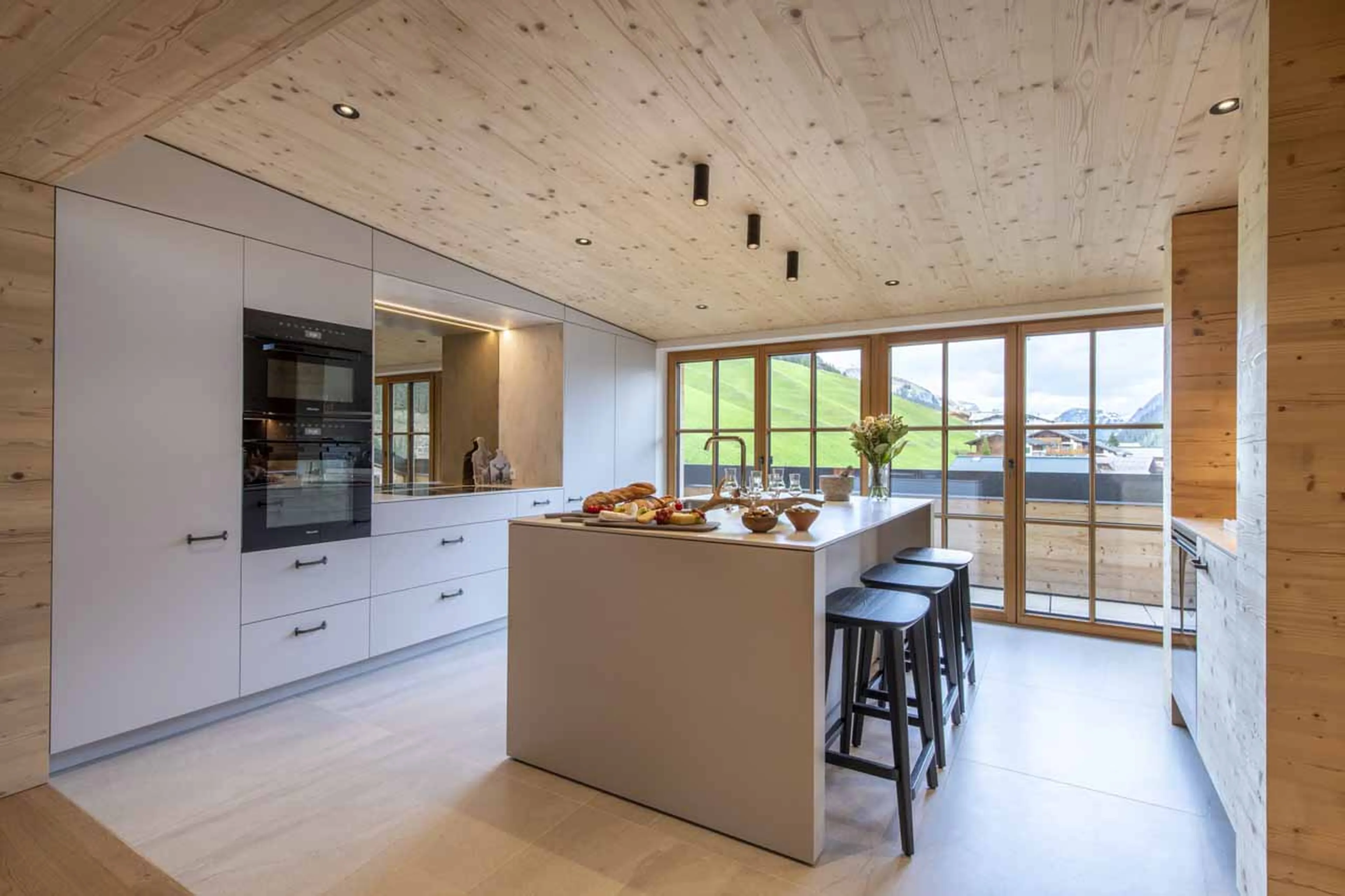 Kitchen with breakfast bar at Brunnenhof Penthouse in Lech