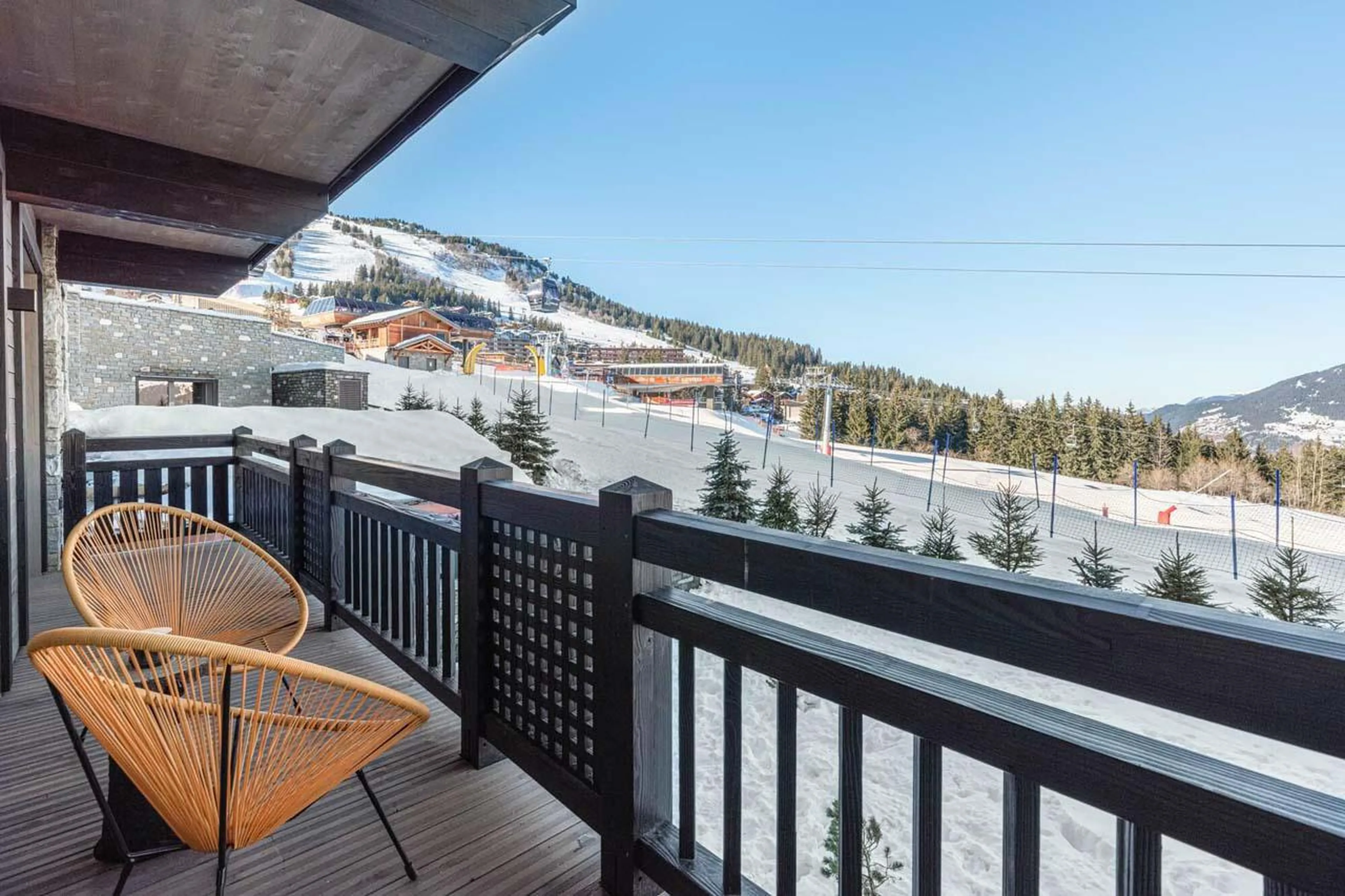 Balcony overlooking the piste at Apartment Castano in Courchevel 1850