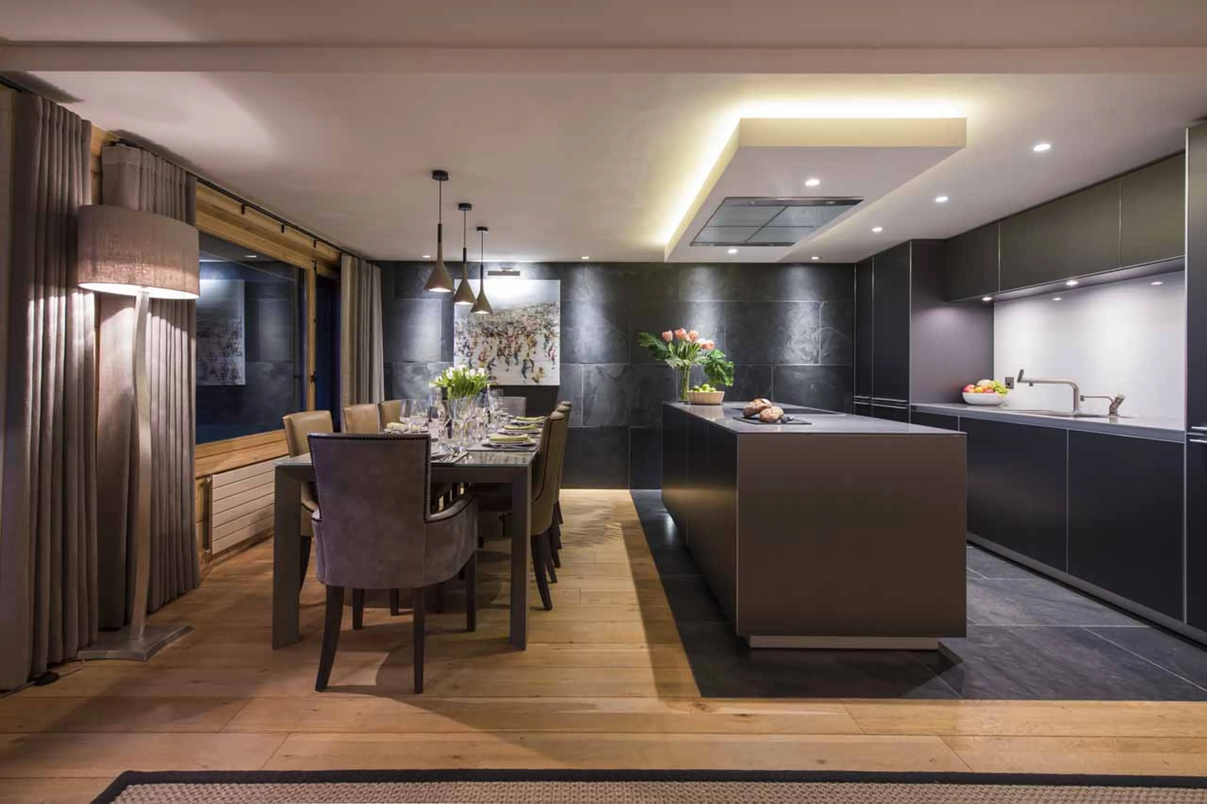 Dining area and modern kitchen at Apartment Fleur de Lin in Verbier