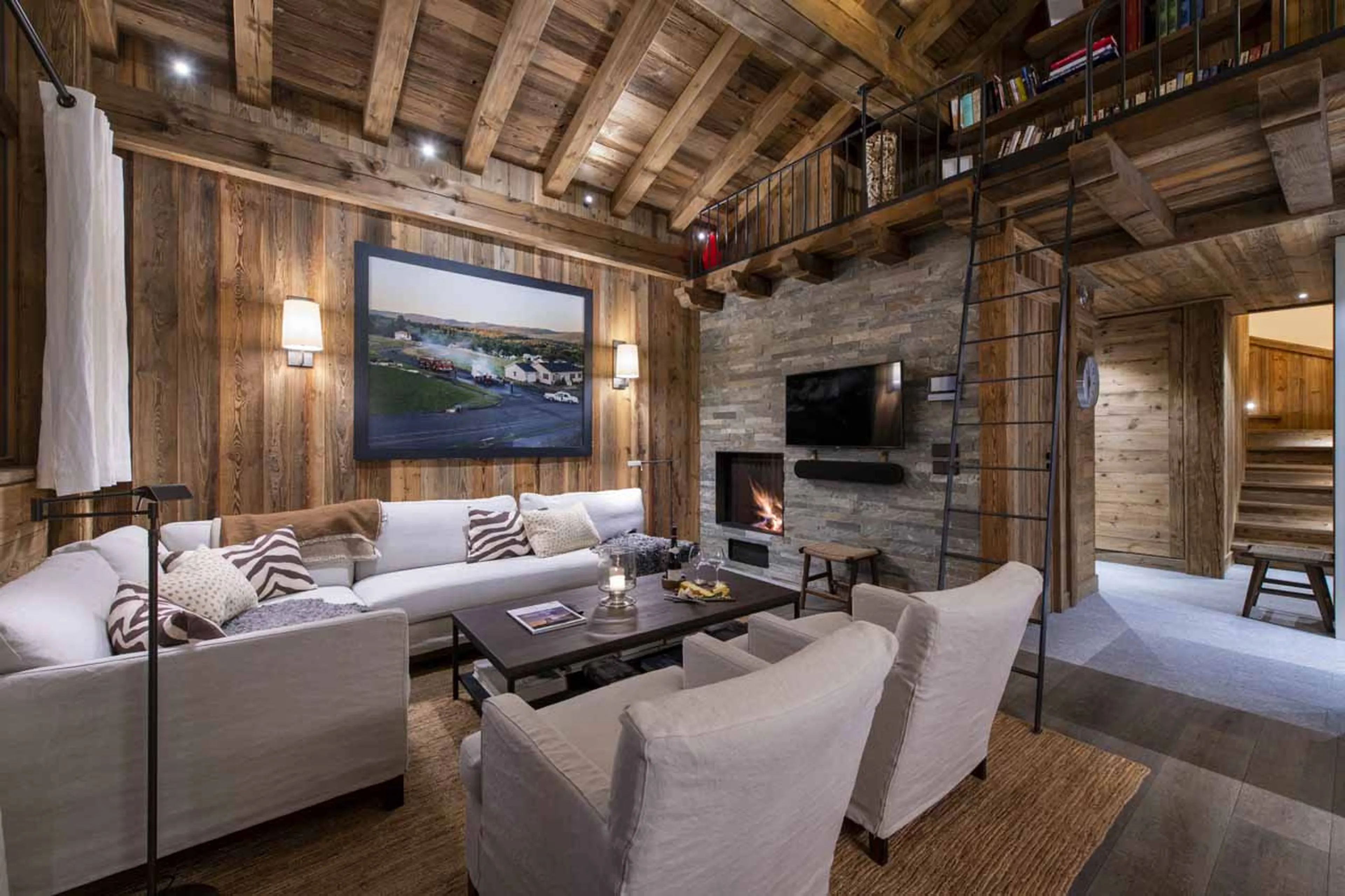 Fireplace in living room of Apartment Grand Pre 4 in Val d'Isere