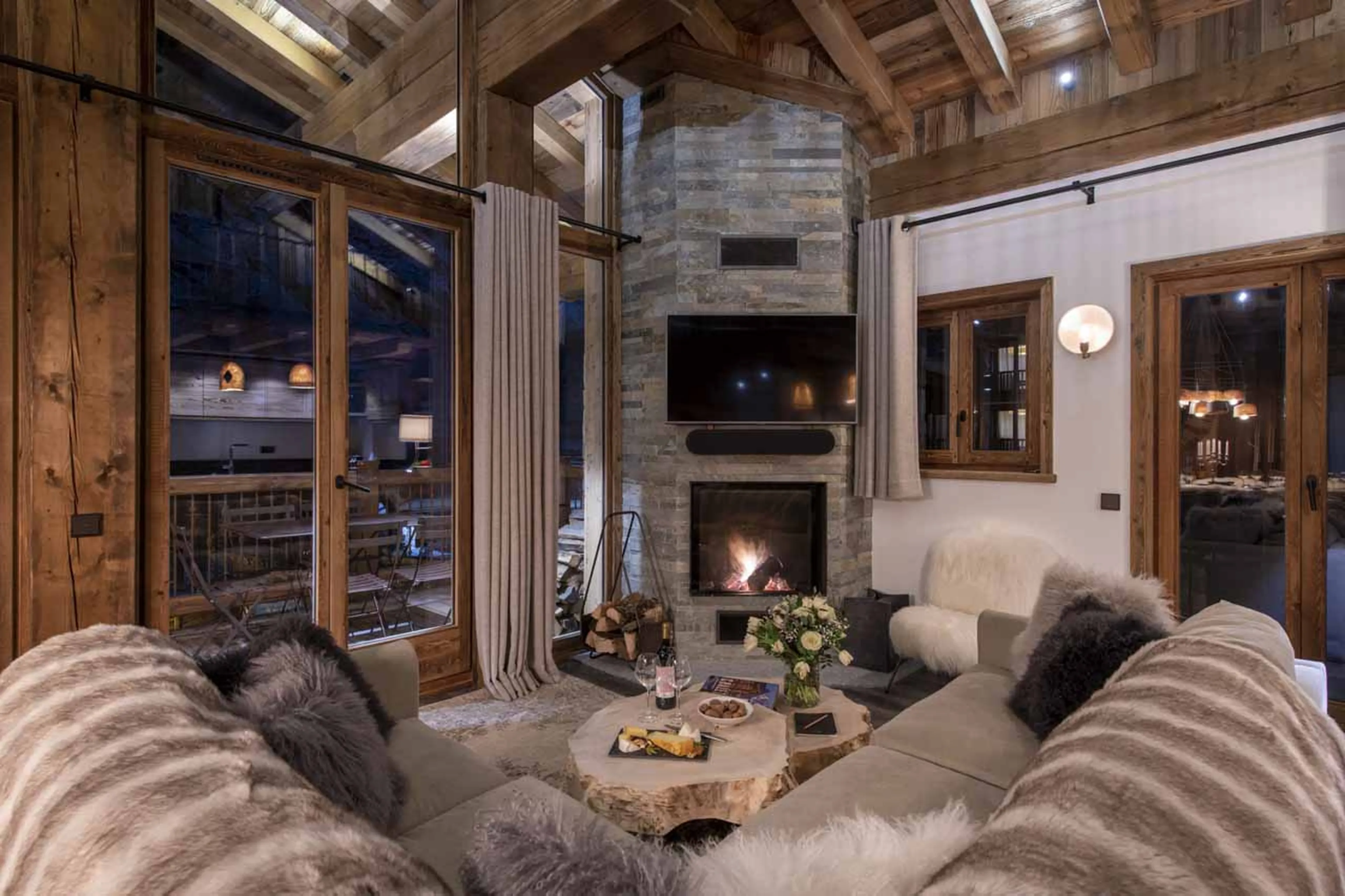 Fireplace in living area of Apartment Grand Pre 3 in Val d'Isere