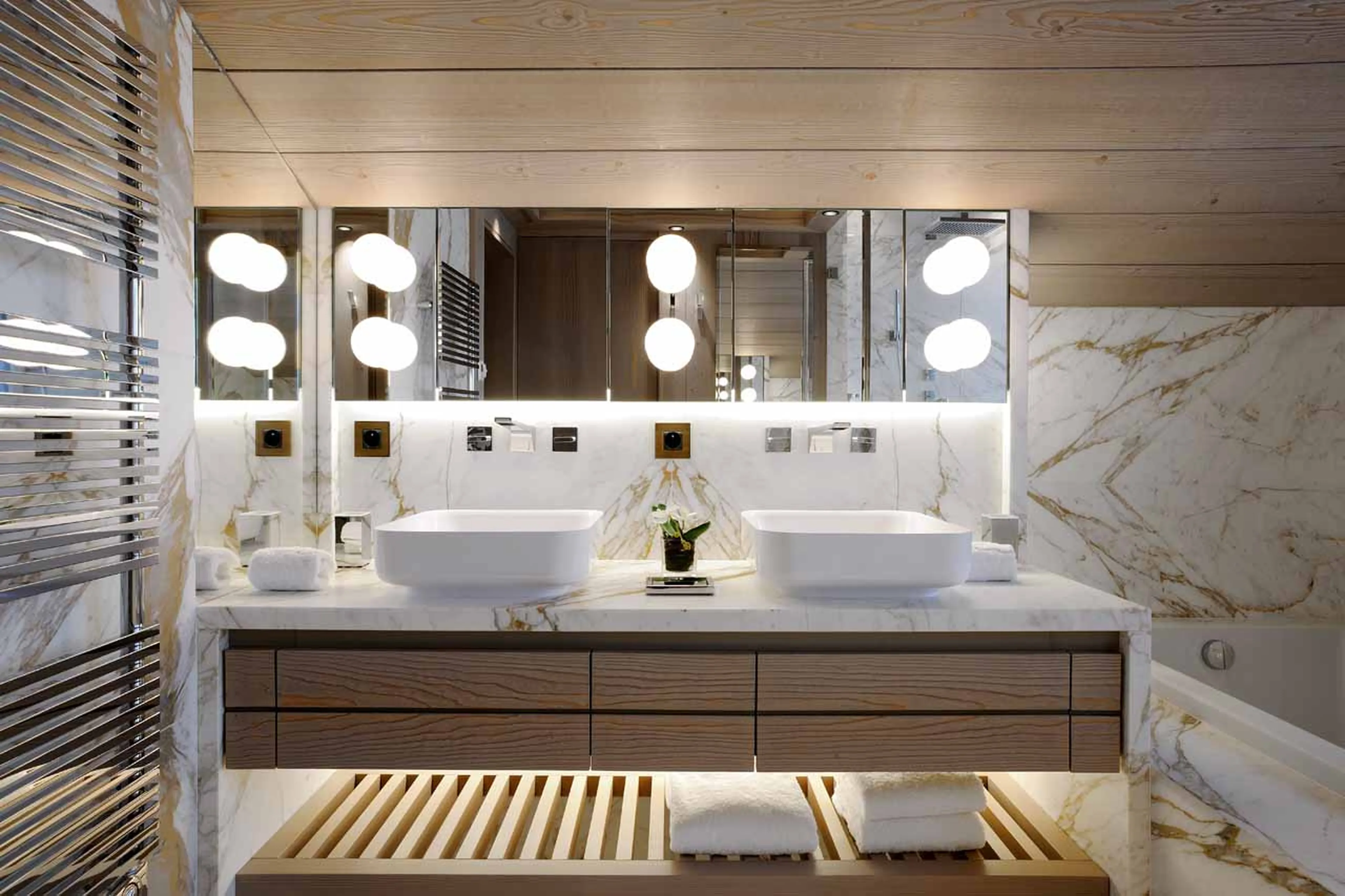 Twin sinks in master bathroom at Apartment L’Empyrée 1850 in Courchevel 1850