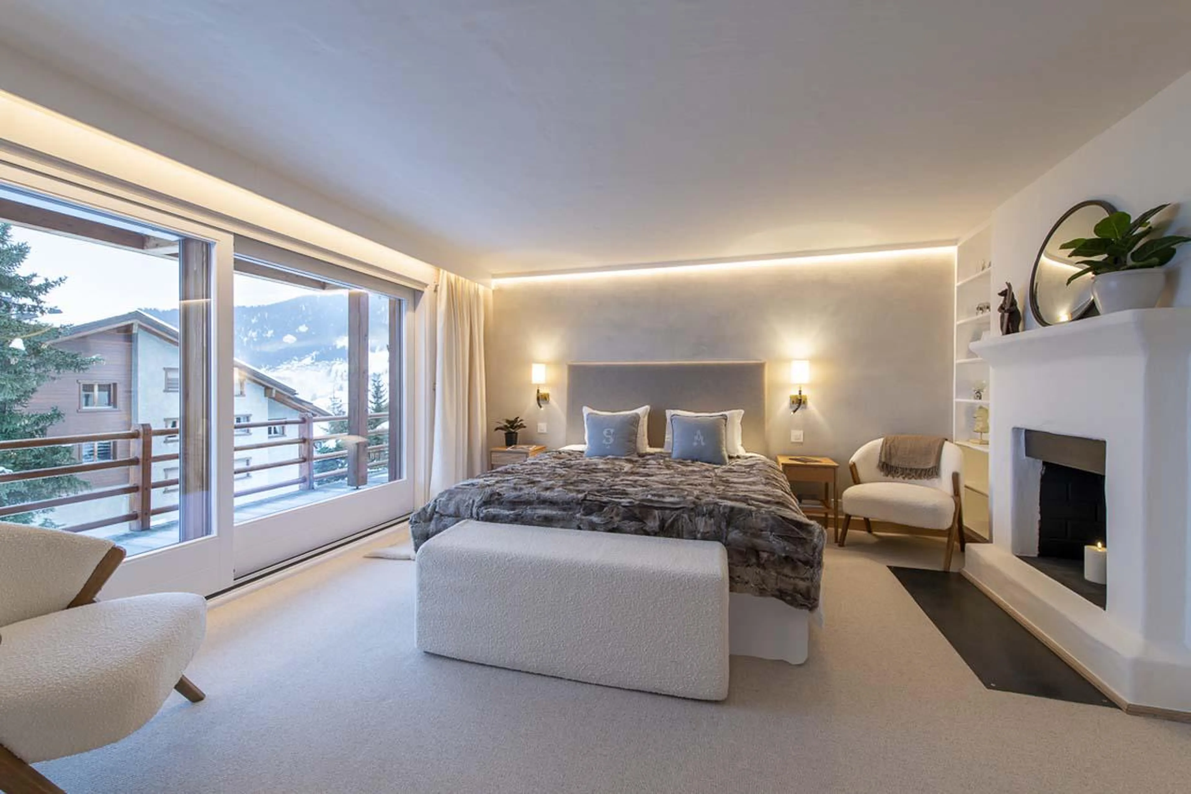 Double master bedroom with balcony access at Apartment Grignote in Verbier
