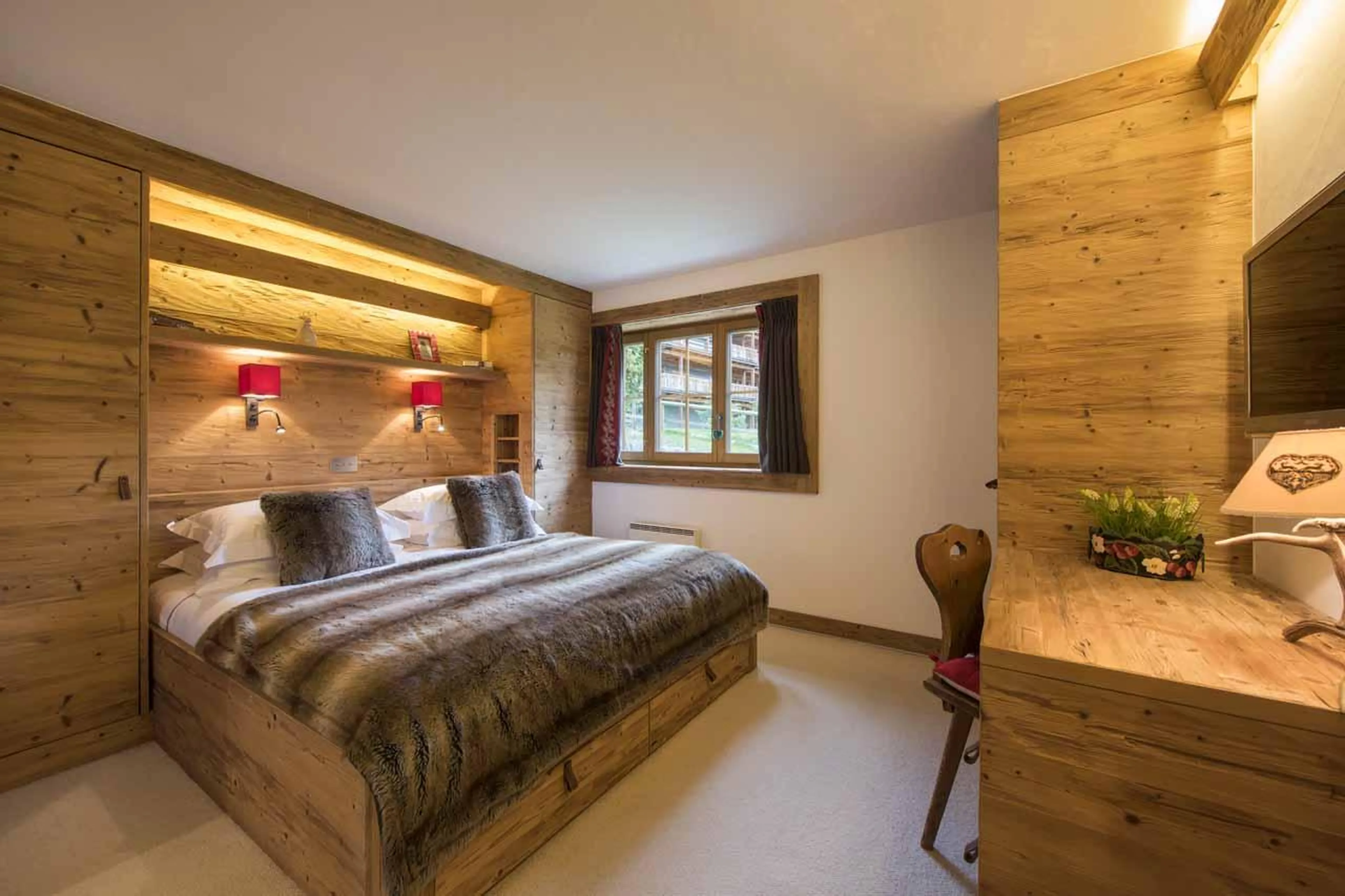 Bedroom one TV at Apartment Hickory in Verbier