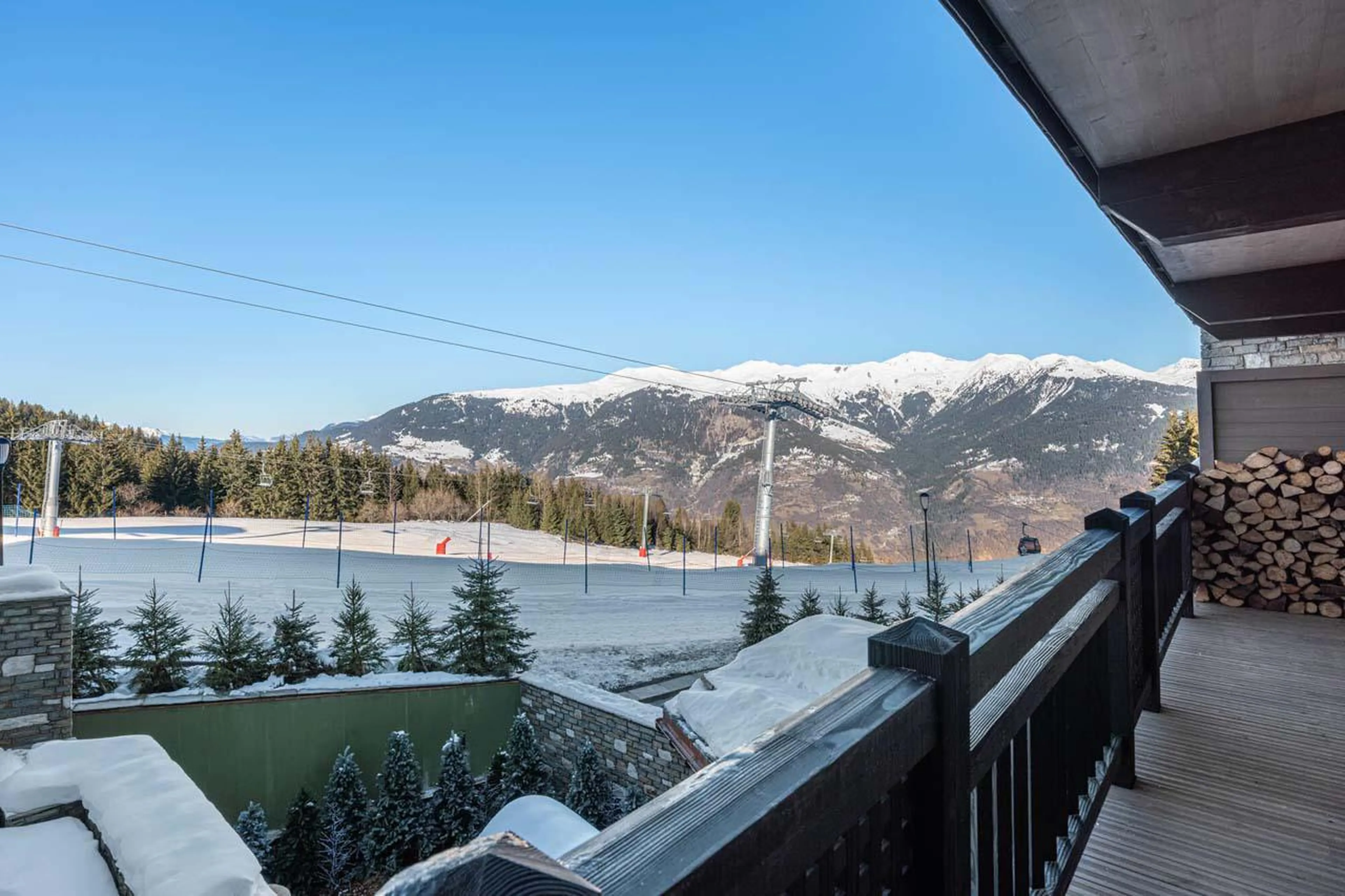 Large balcony with beautiful views over the piste at Apartment Intresso in Courchevel 1850