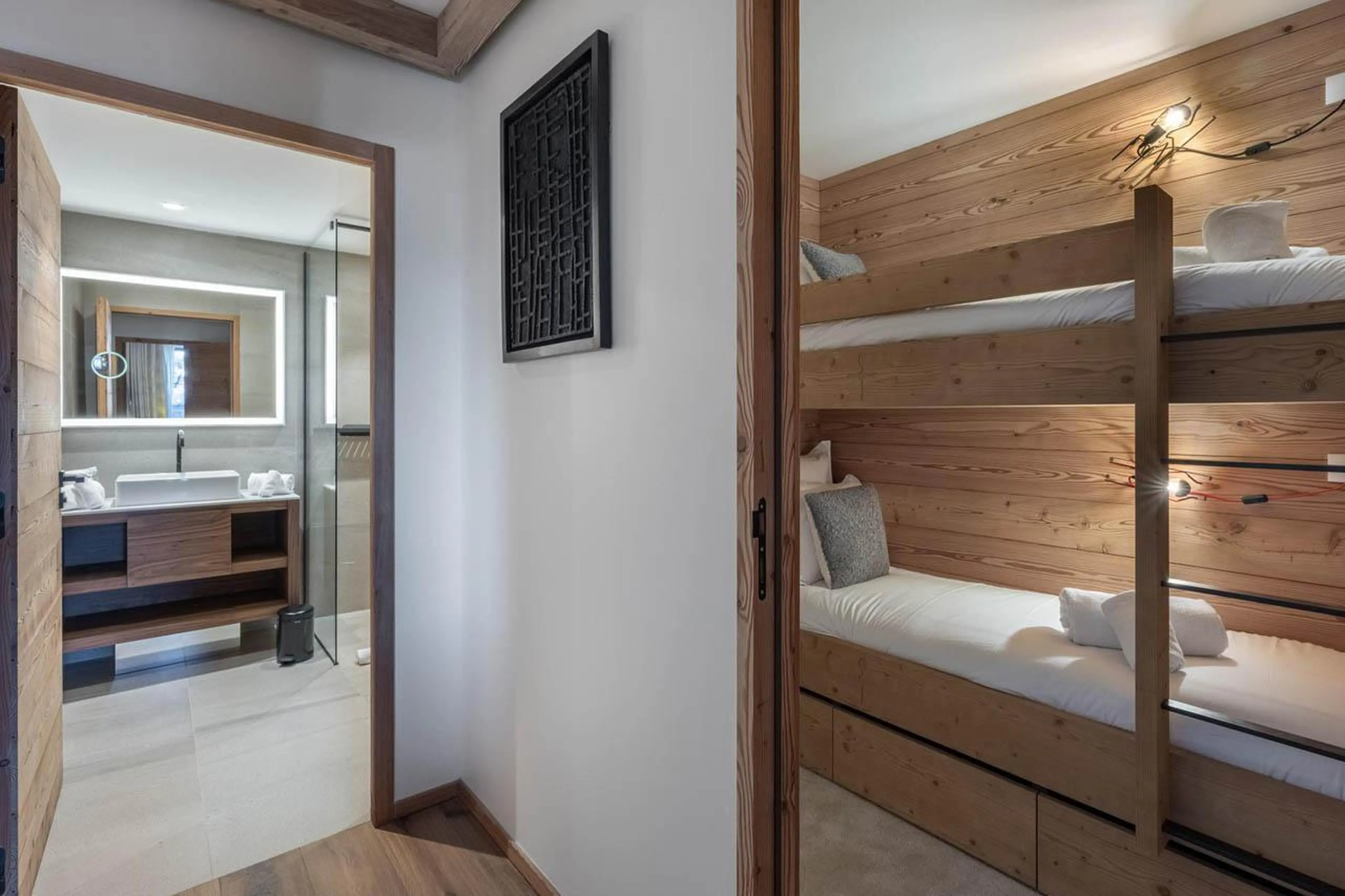 Bunk beds with access to shared shower room at Apartment Intresso in Courchevel 1850