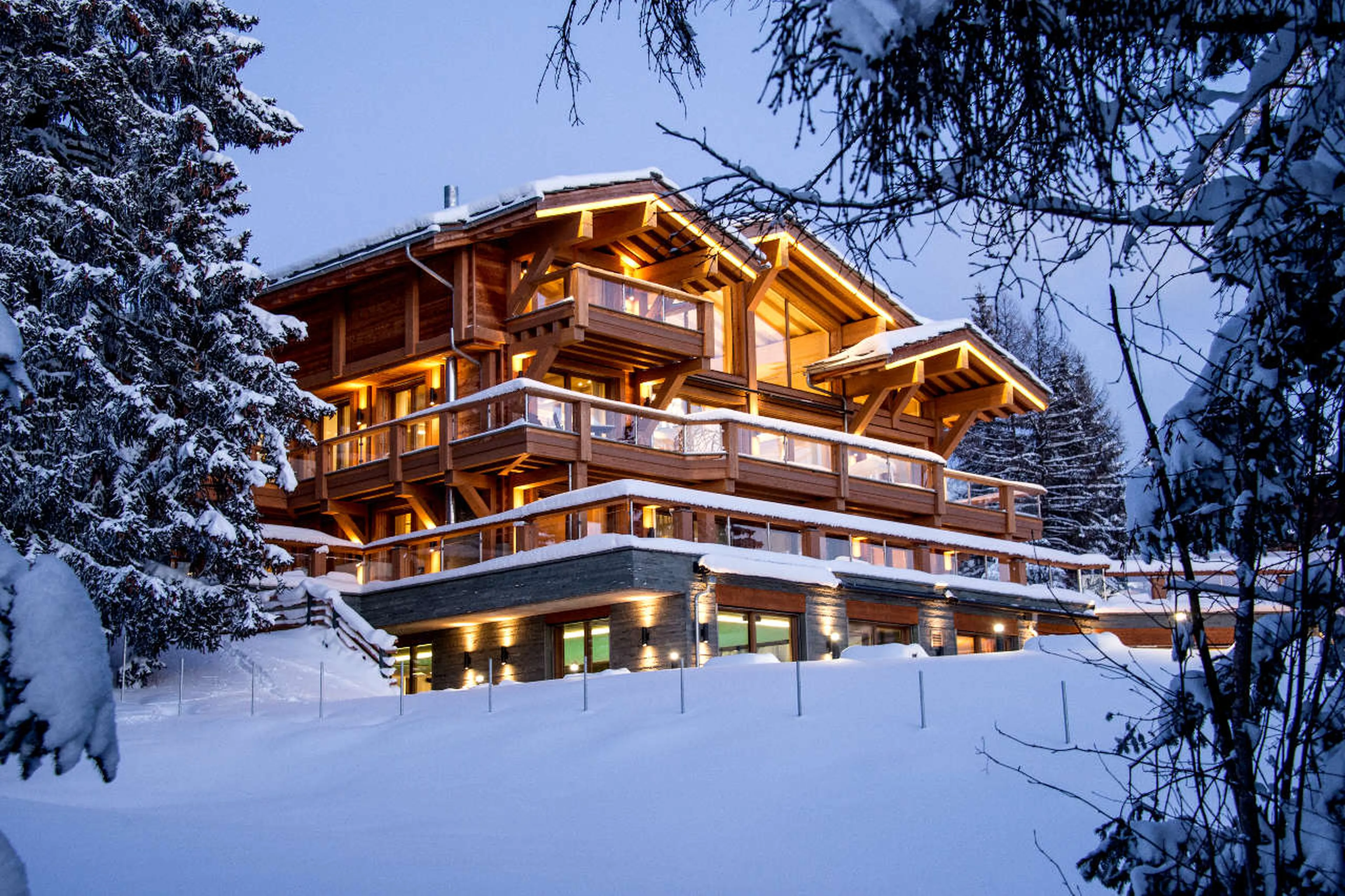Exterior of apartment building housing La Toula in Crans-Montana