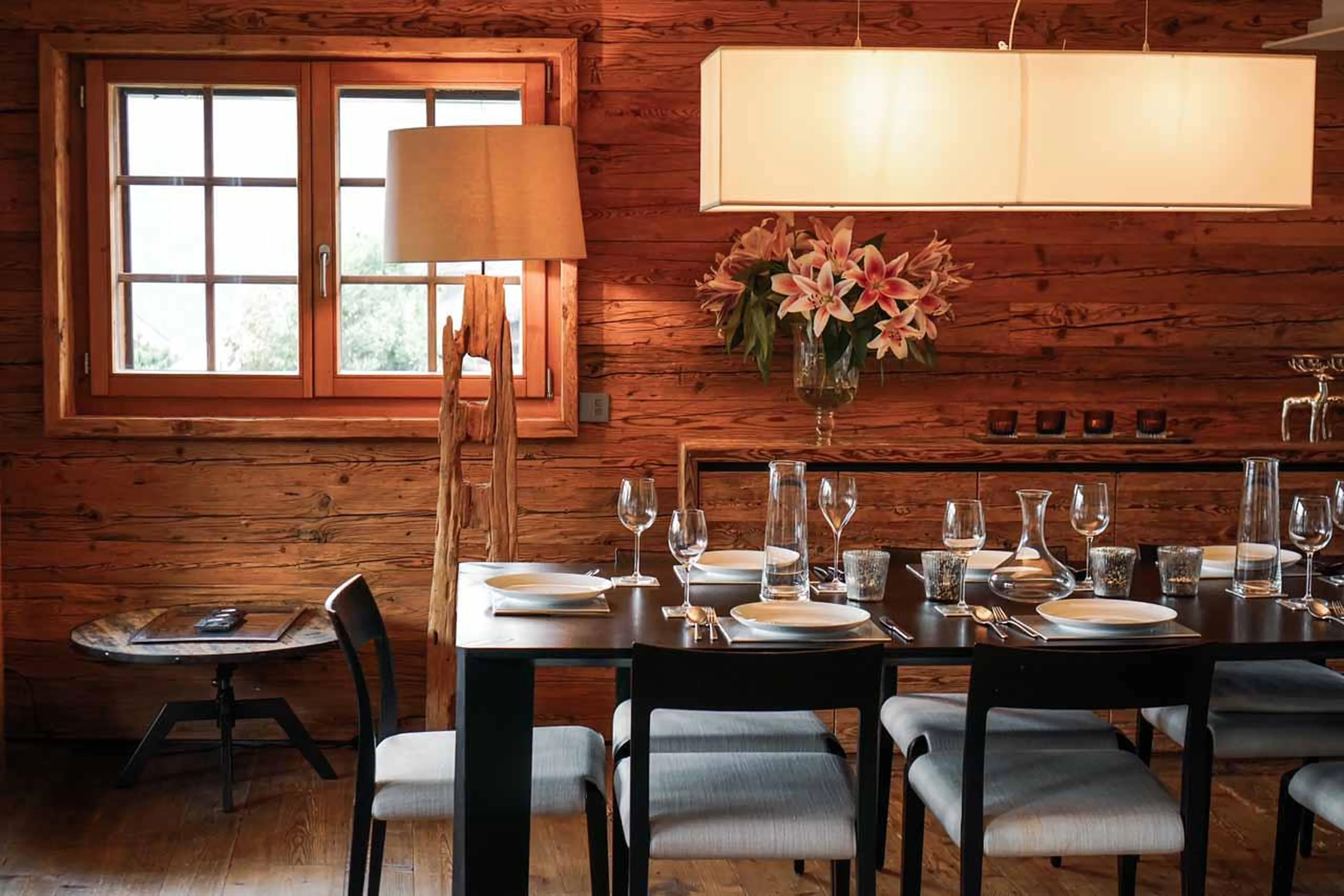 Dining table in living area of La Vallée Blanche in Verbier