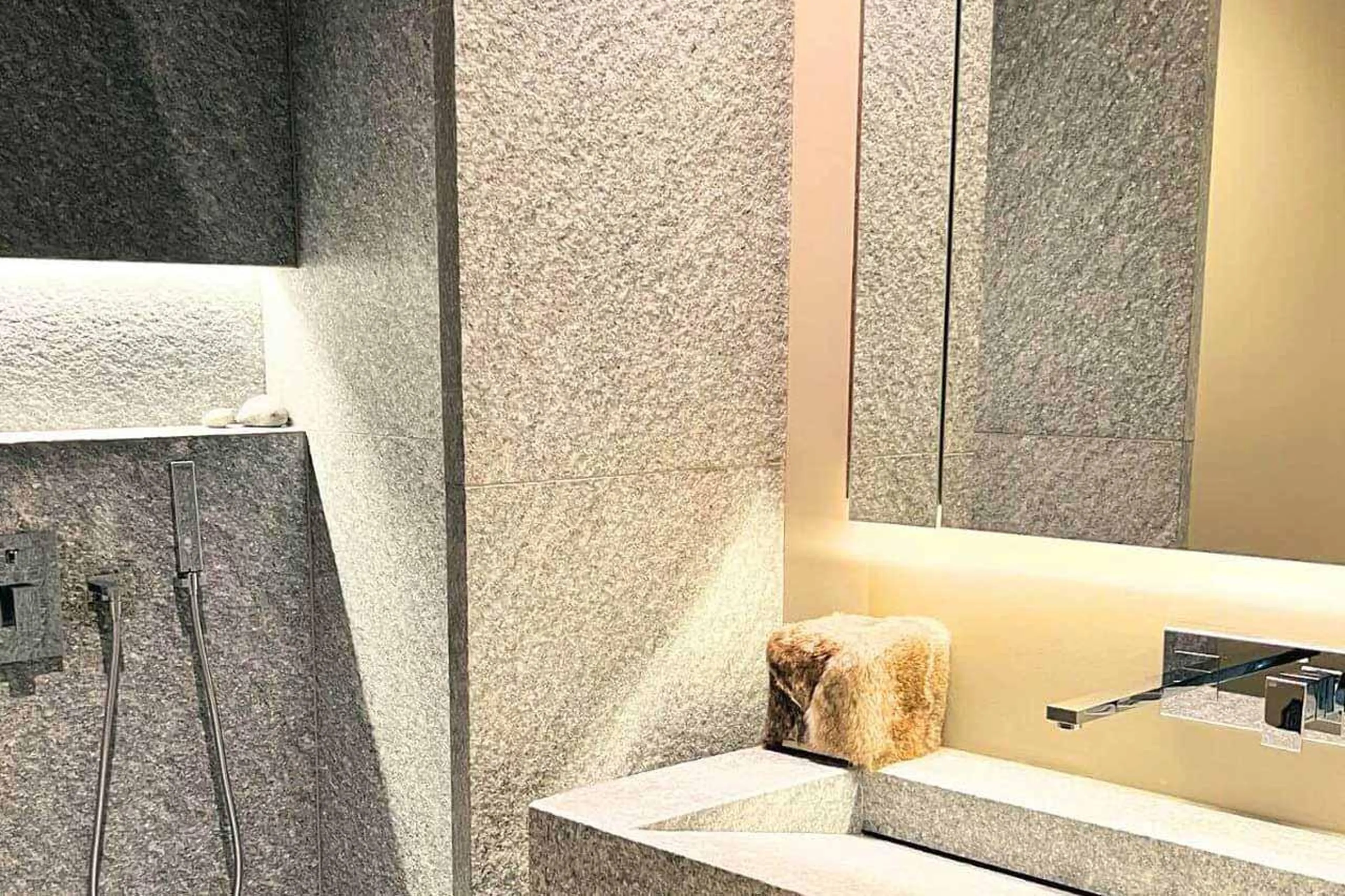 En-suite shower room and basin in Apartment Lain Alpin, St Moritz