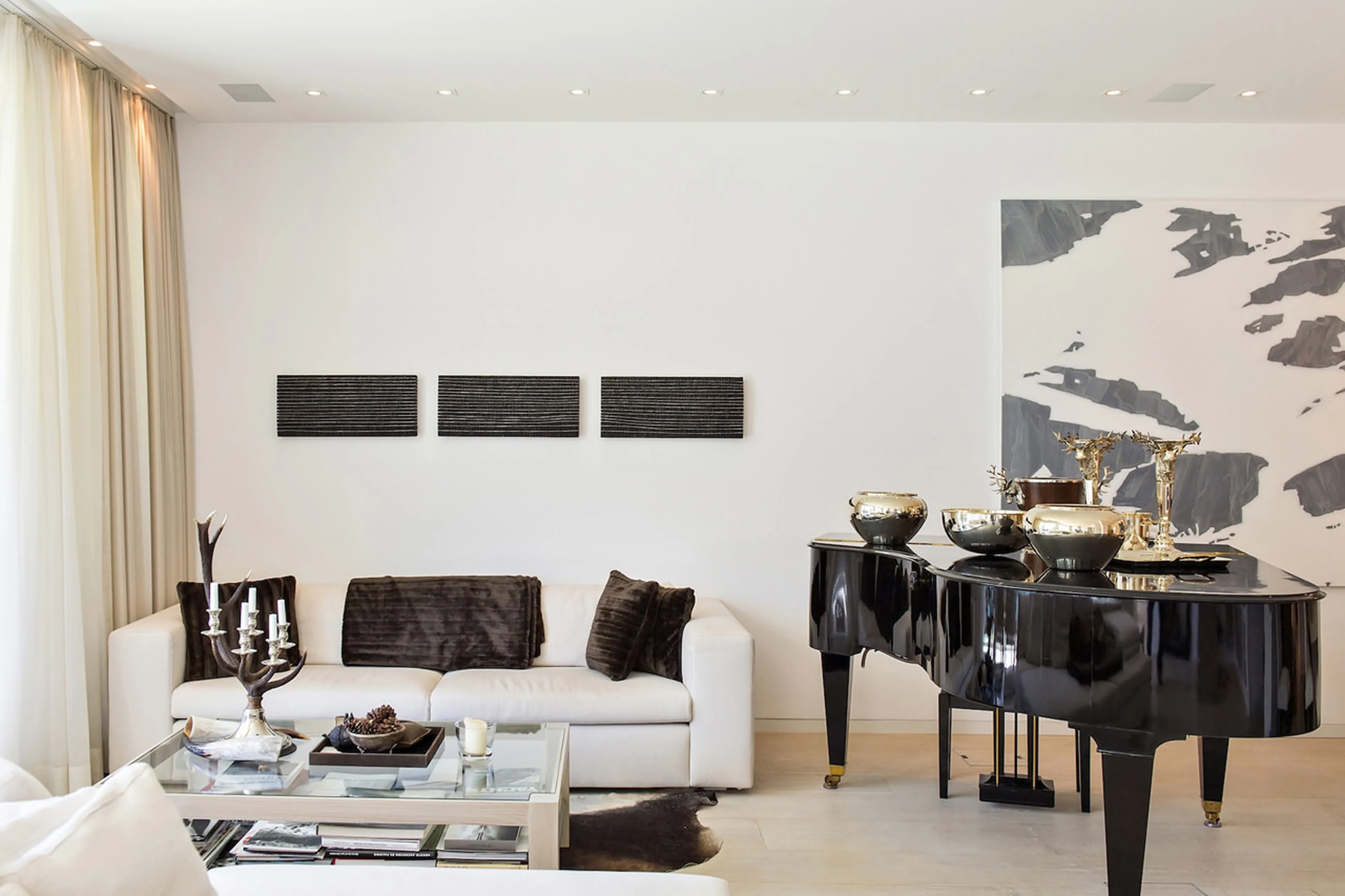 Grand piano in living area of Apartment Lakeside in St Moritz