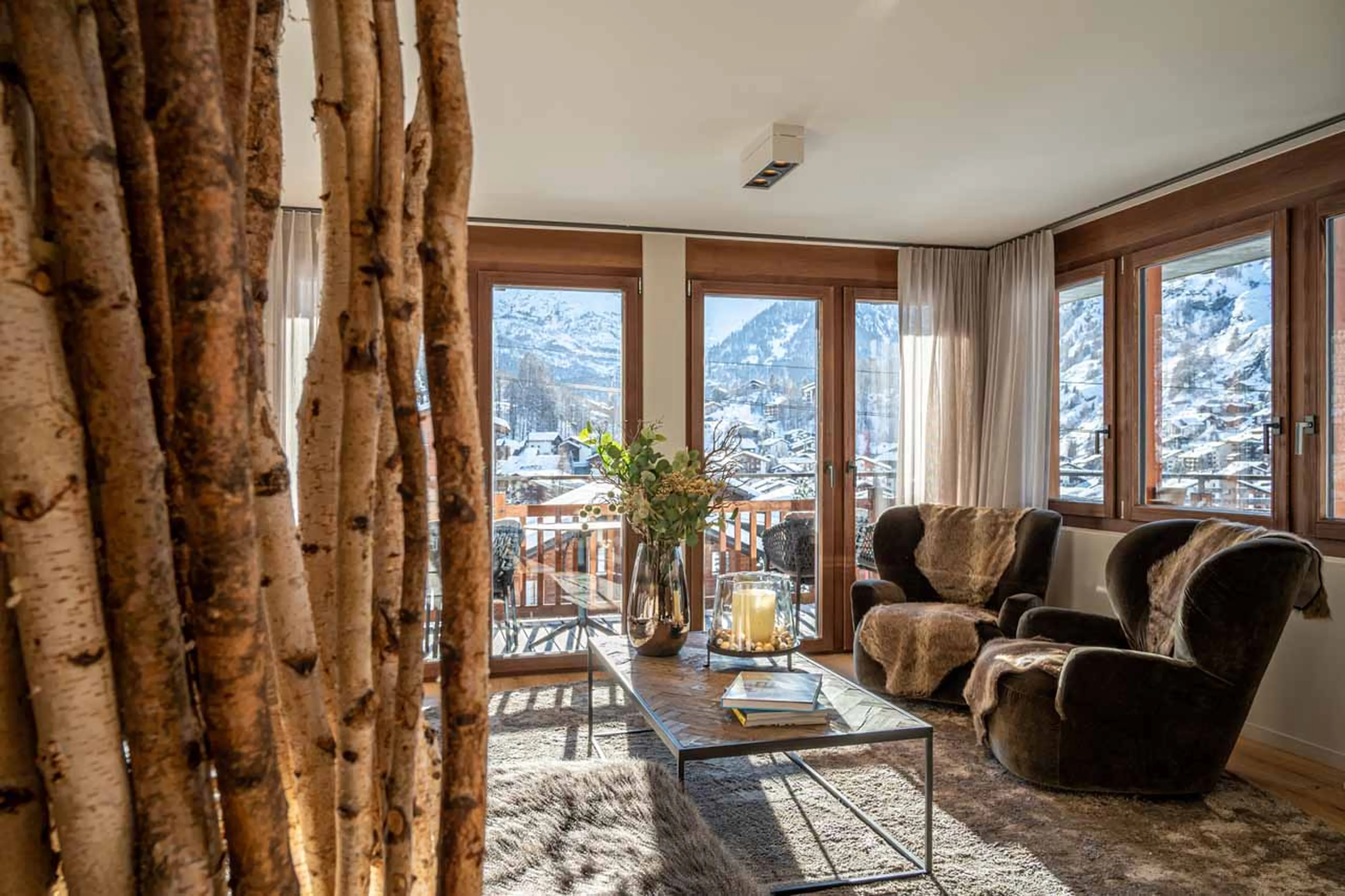 Cosy sofas in living area of Apartment Nabucco in Zermatt