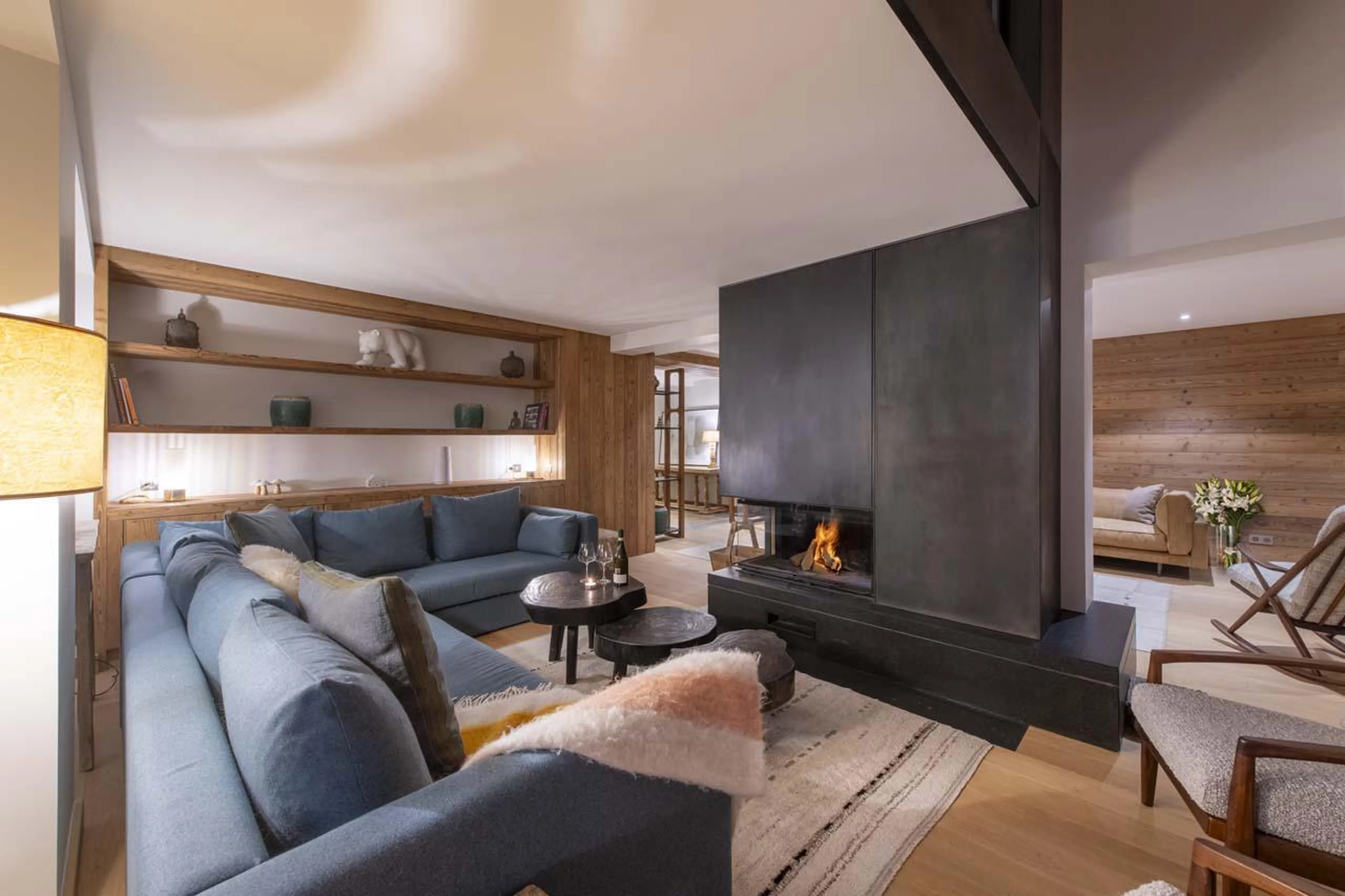 Sofa and fireplace at Apartment Nanuq in Meribel
