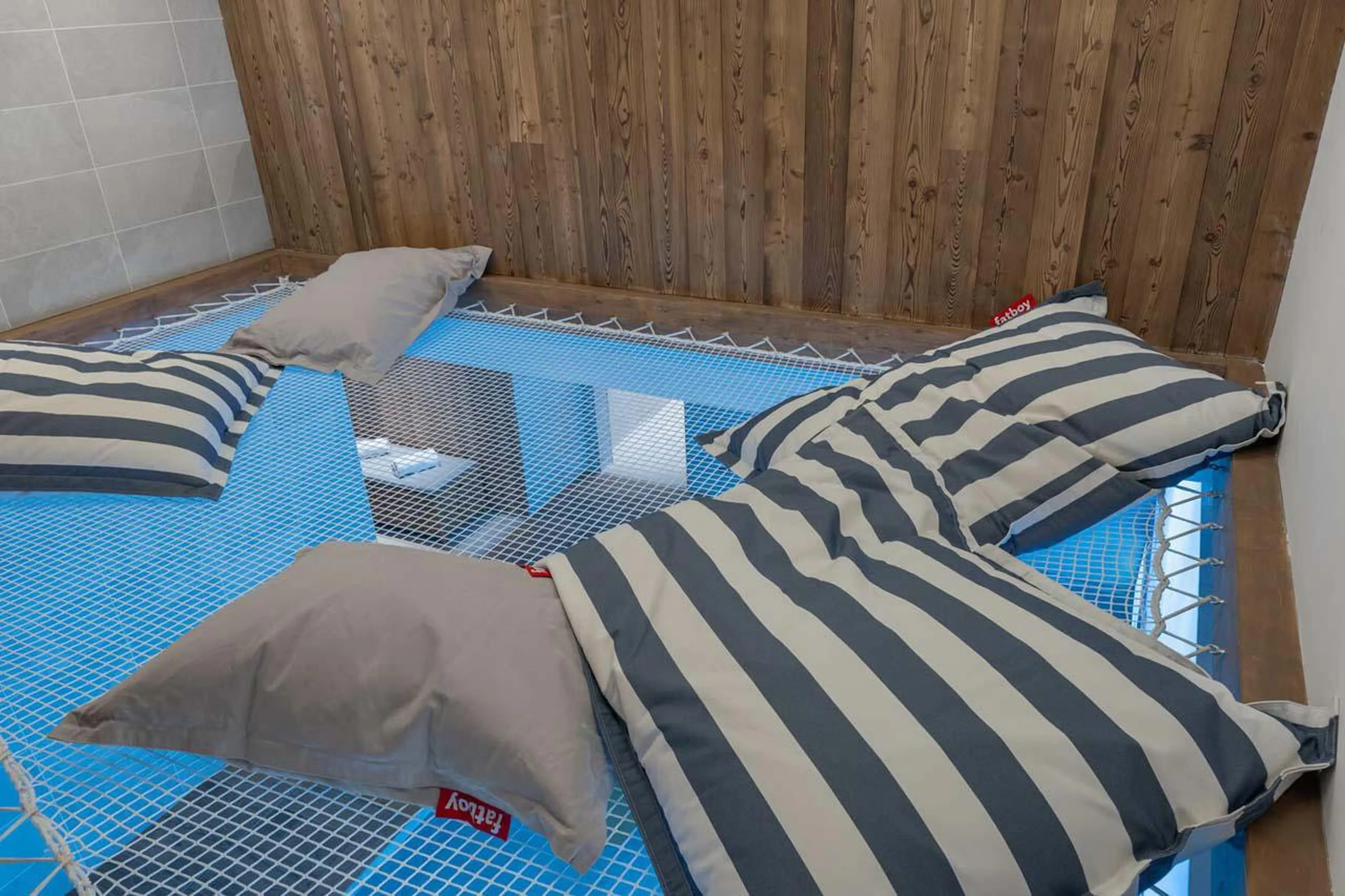 Relaxation space above swimming pool at Apartment Nettuno in Courchevel 1850