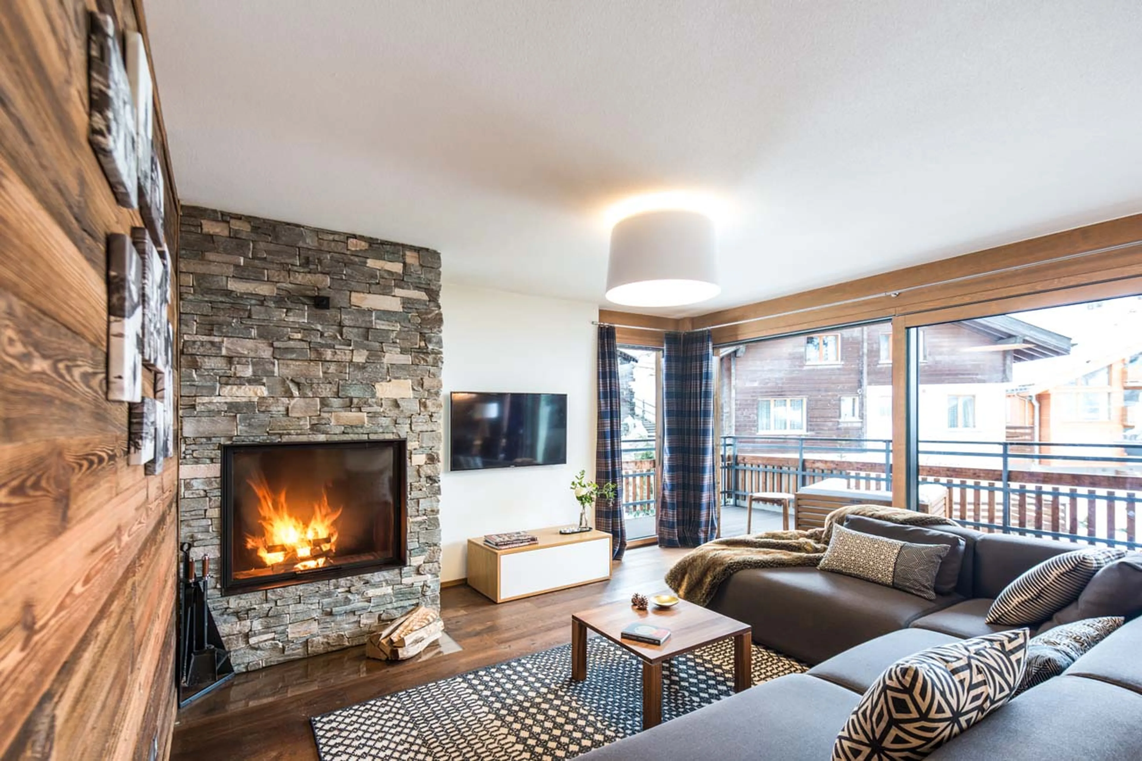 Access to balcony from living room of Apartment Petit in Zermatt